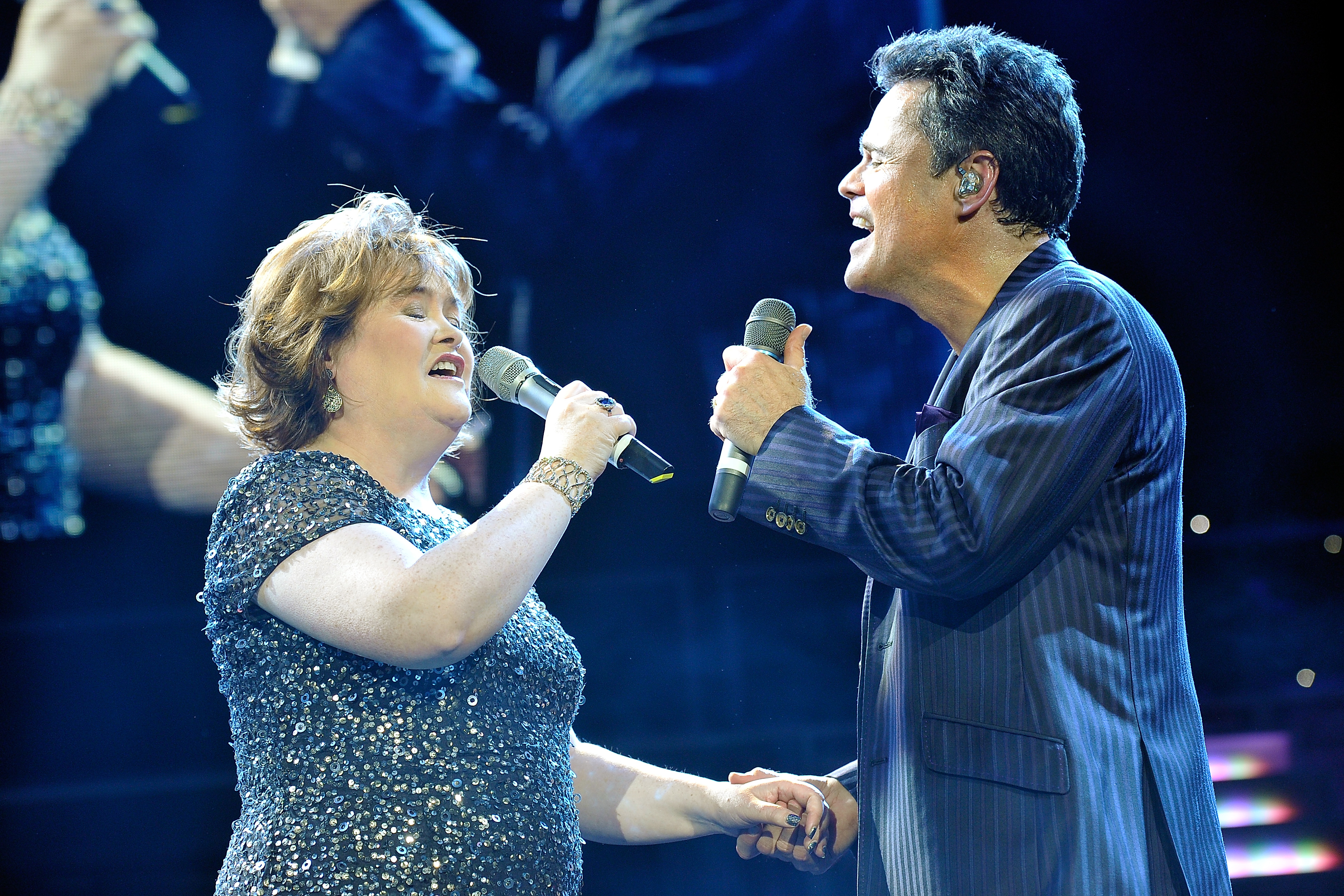 Susan Boyle performs with Donny Osmond during the Donny and Marie Osmond concert on January 20, 2013 in London, England | Source: Getty Images