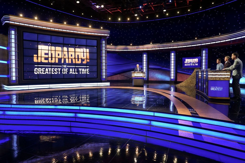 JEOPARDY! host Alex Trebek and contestants filming an episode of the show on December 11, 2019 | Photo: Getty Images