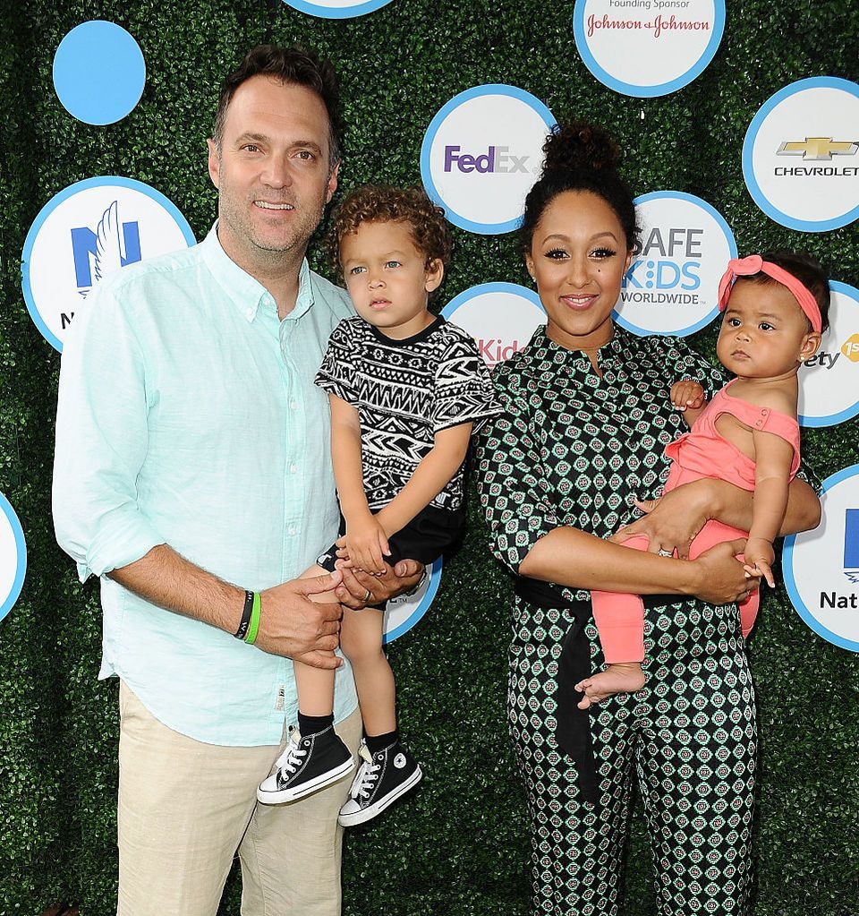 Adam Housley, Tamera Mowry and their kids Aden and Ariah at the Safe Kids Day event at Smashbox Studios on April 24, 2016 in Culver City, California. | Source: Getty Images