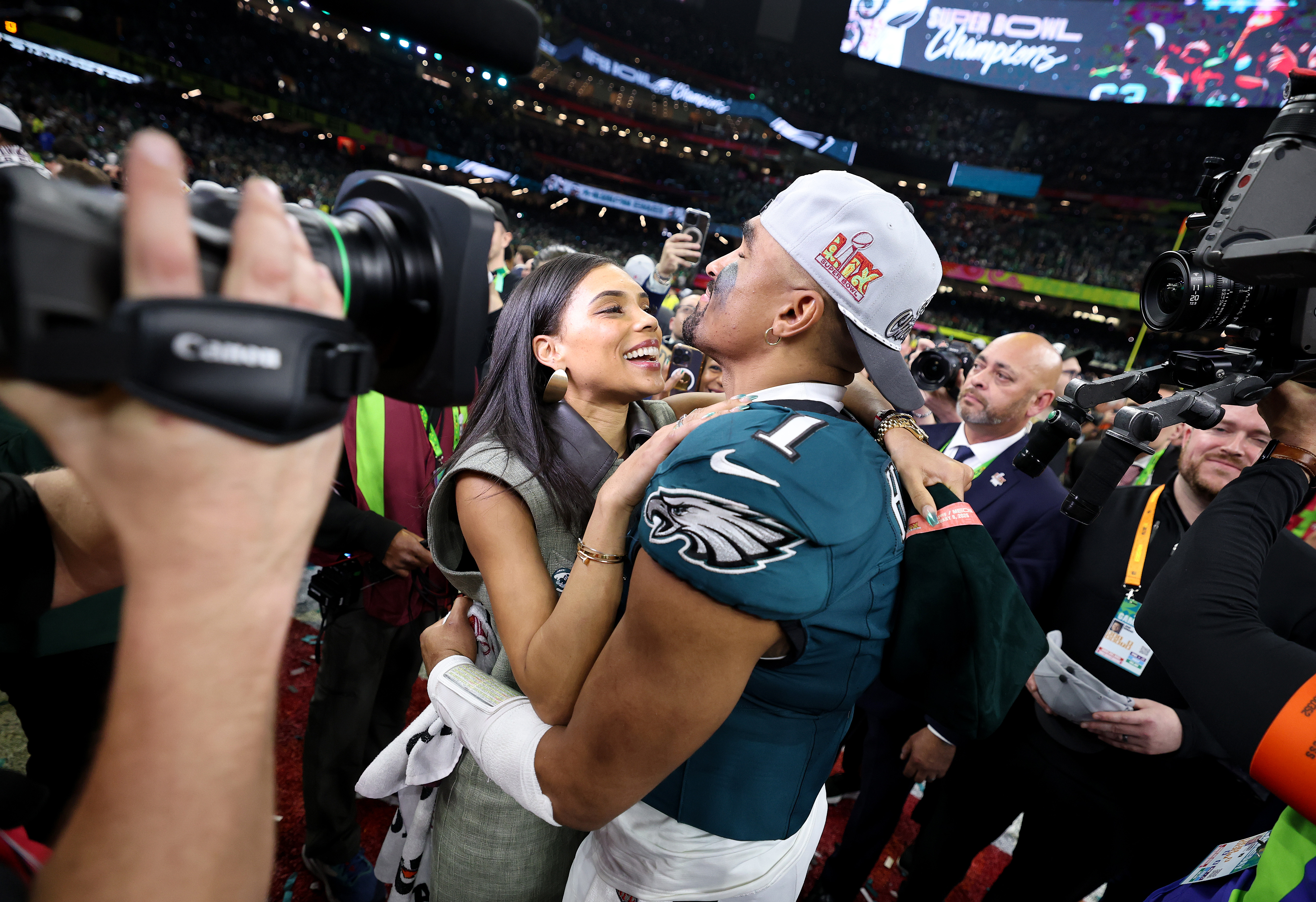 Jalen Hurts of the Philadelphia Eagles and Bryonna Burrows embracing after defeating the Kansas City Chiefs 40-22 to win Super Bowl LIX at Caesars Superdome on February 9, 2025, in New Orleans, Louisiana. | Source: Getty Images