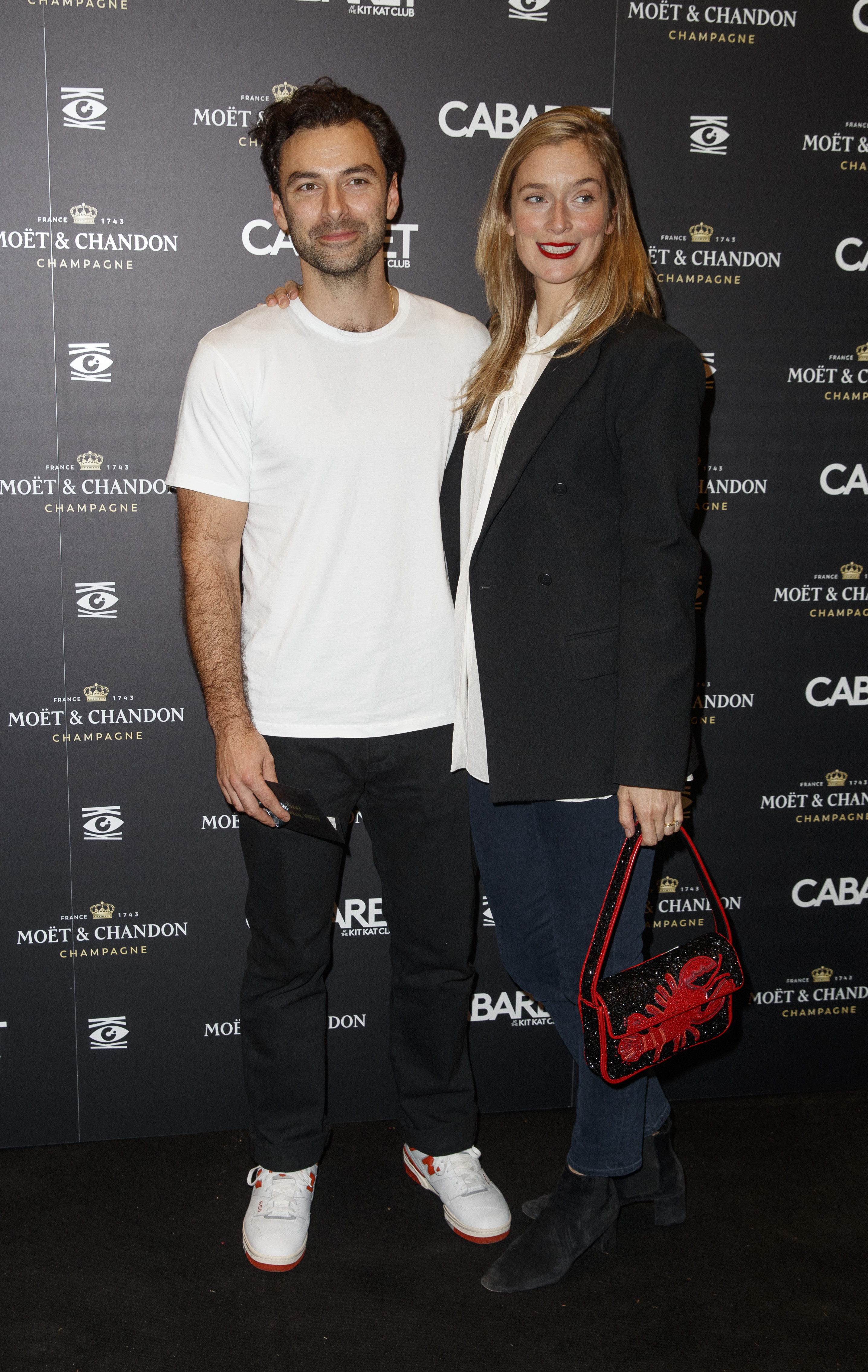 Aidan Turner and Caitlin Fitzgerald attend the Gala Night performance of "Cabaret at the Kit Kat Club" on October 27, 2022 in London, England | Source: Getty Images