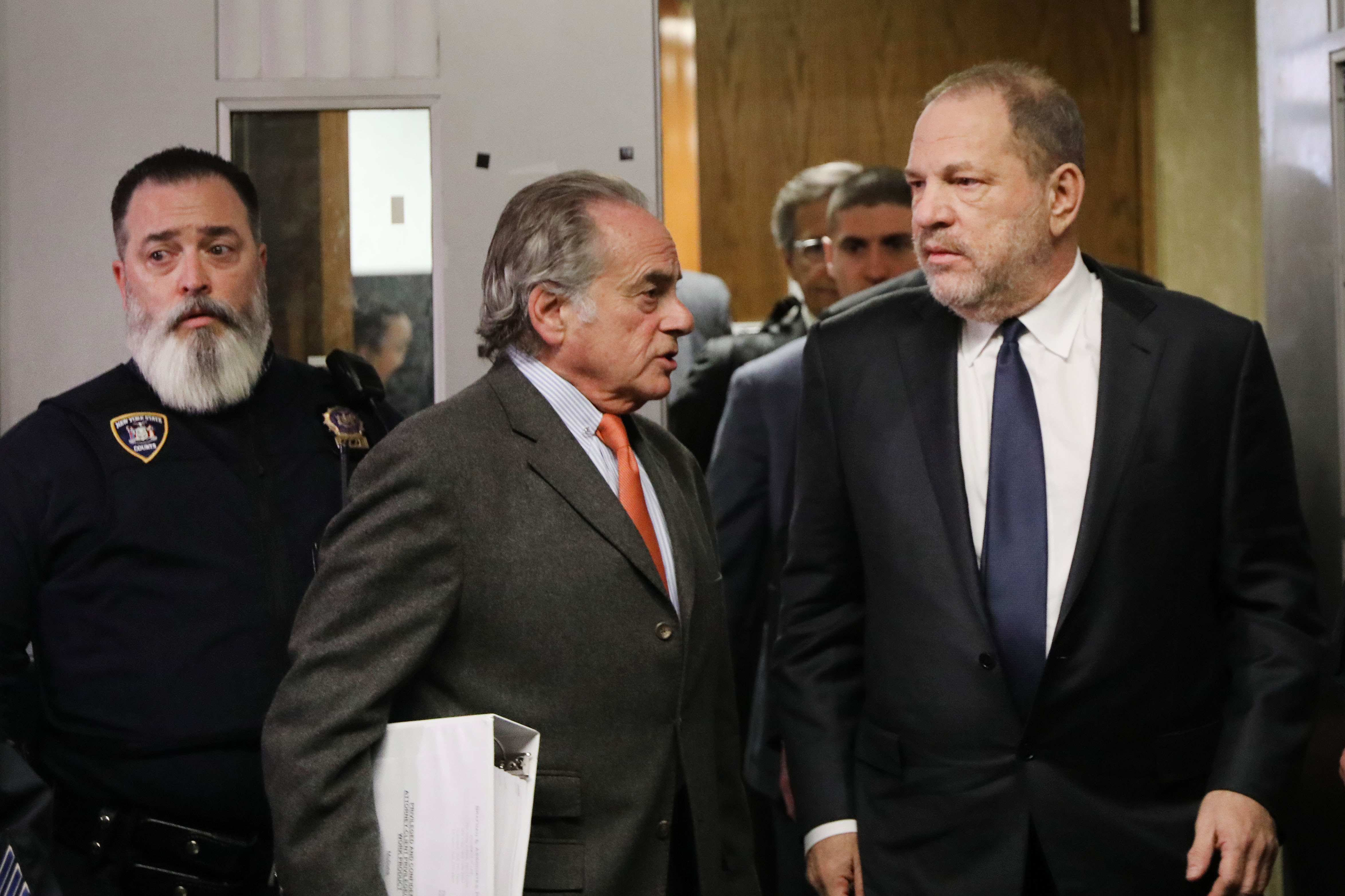 Harvey Weinstein (R) leaves with his lawyer Benjamin Brafman following a court hearing at New York Criminal Court on December 20, 2018, in New York City | Source: Getty Images