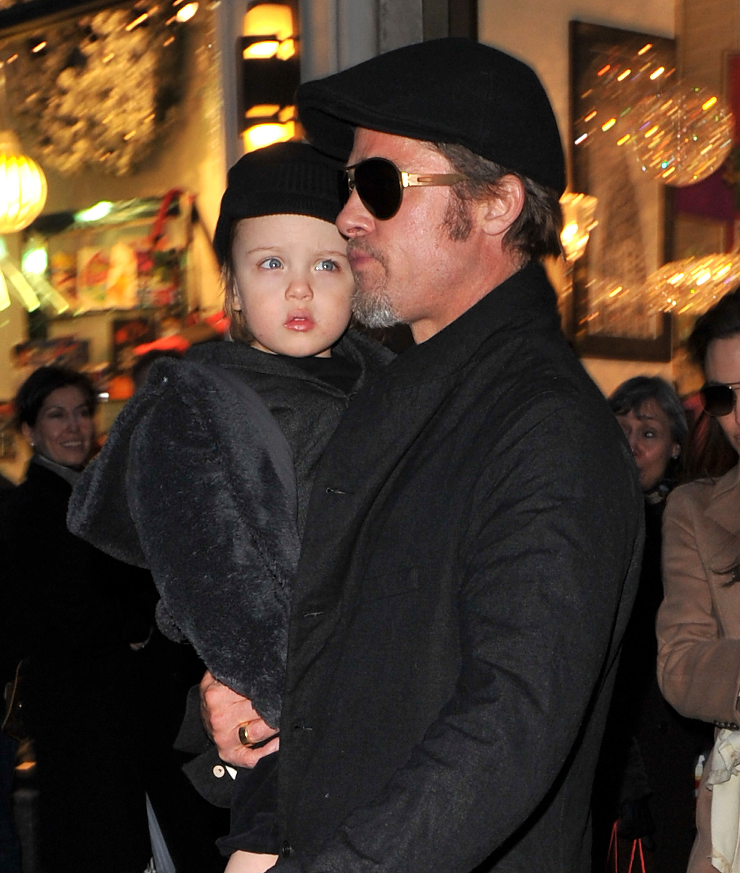 Brad Pitt visits Lee's Art Shop with Knox Jolie-Pitt on December 4, 2010, in New York City.