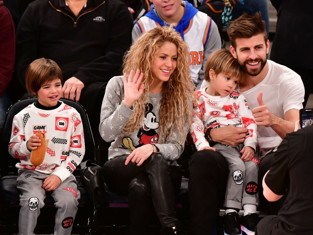 Shakira and Gerard Piqué with their sons Milan and Sasha Piqué Mebarak attend the New York Knicks Vs Philadelphia 76ers game at Madison Square Garden on December 25, 2017, in New York City. | Source: Getty Images