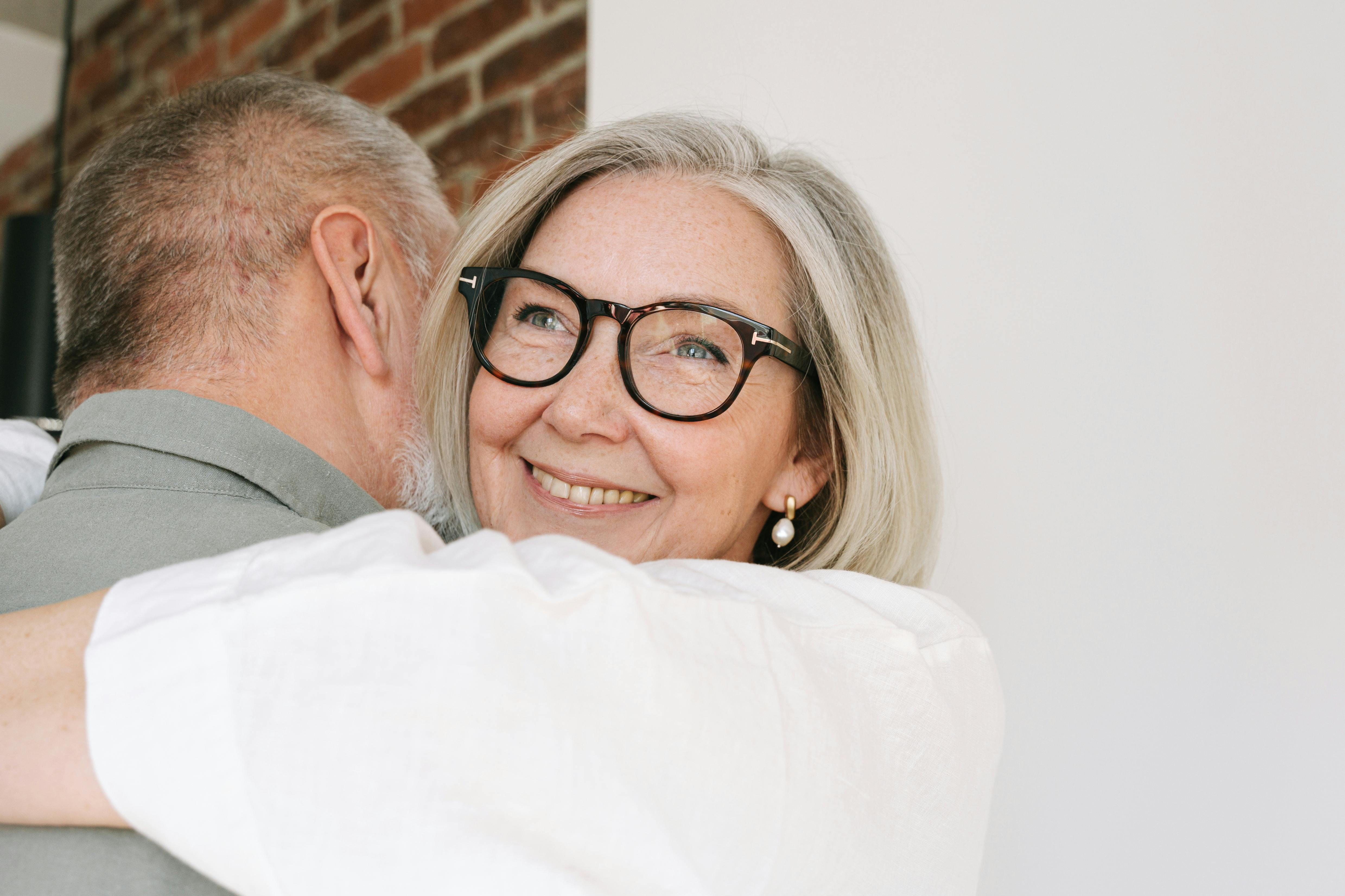 A woman hugging her son | Source: Pexels