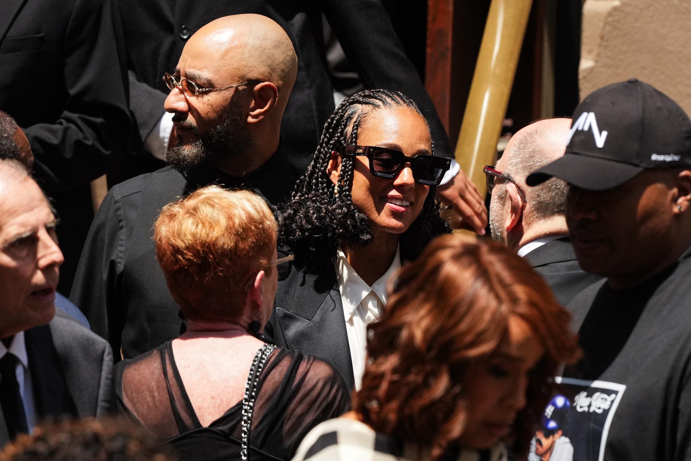 Alicia Keys and Swizz Beatz were among the many stars who gathered to celebrate Clive Davis' extraordinary life and legacy. | Source: Getty Images