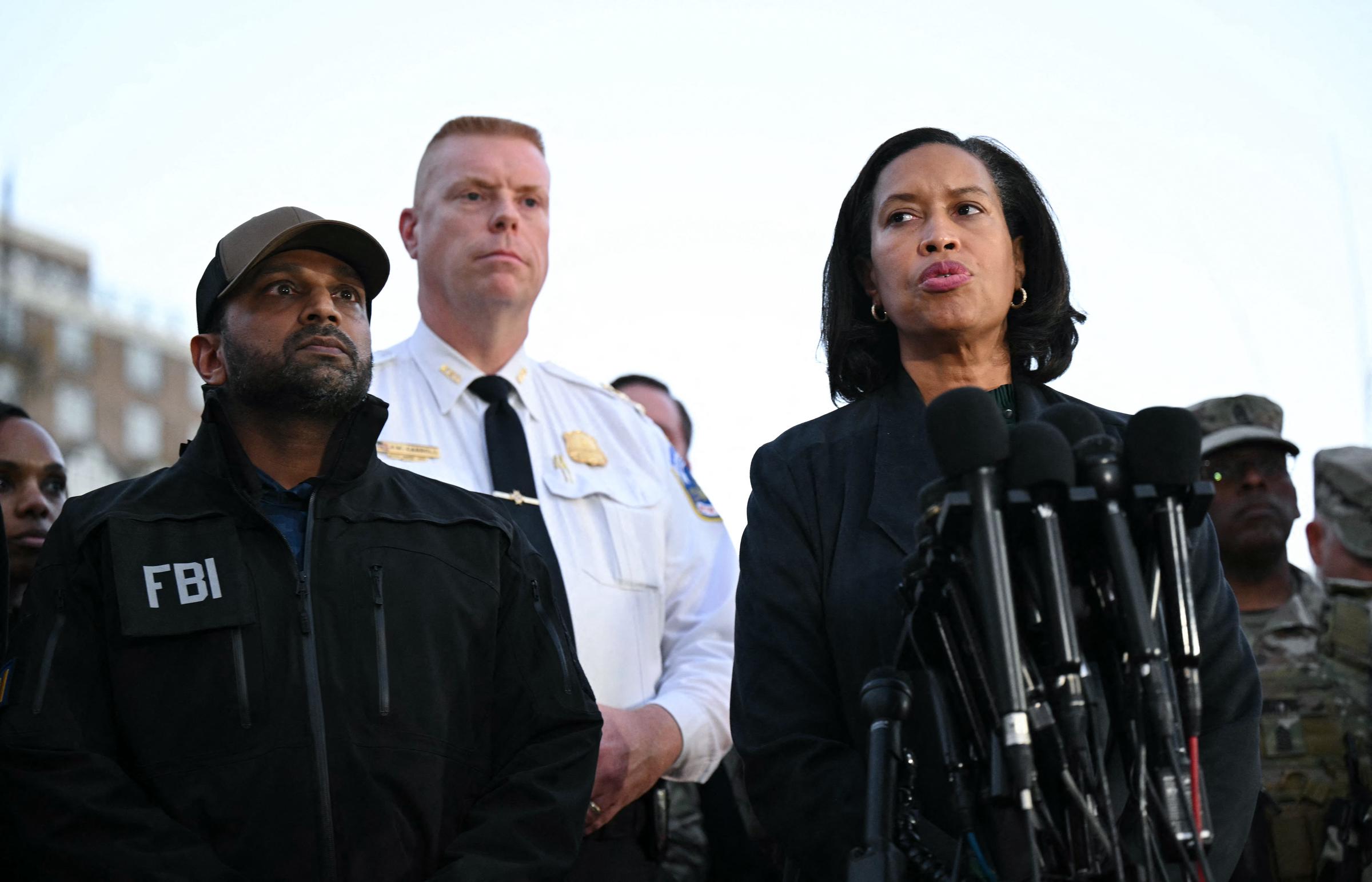 FBI Director Kash Patel, Executive Assistant Chief of the Washington Metropolitan Police Department Jeffery Carroll, and Washington, DC Mayor Muriel Bowser speak to the media on November 26, 2025 in Washington, DC | Source: Getty Images