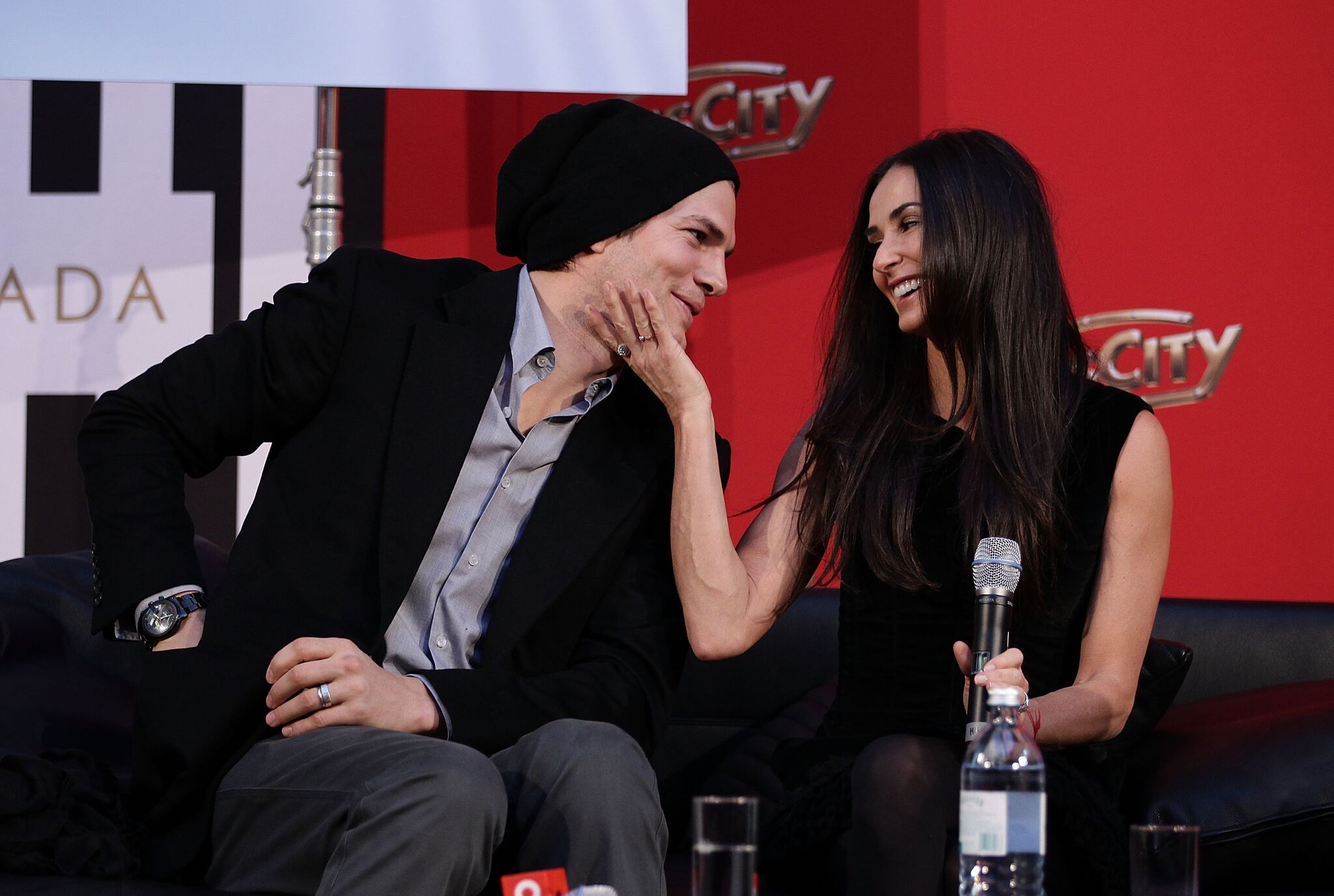 Demi Moore and Ashton Kutcher attend the photo call for their Charity Gala at PlusCity | Getty Images