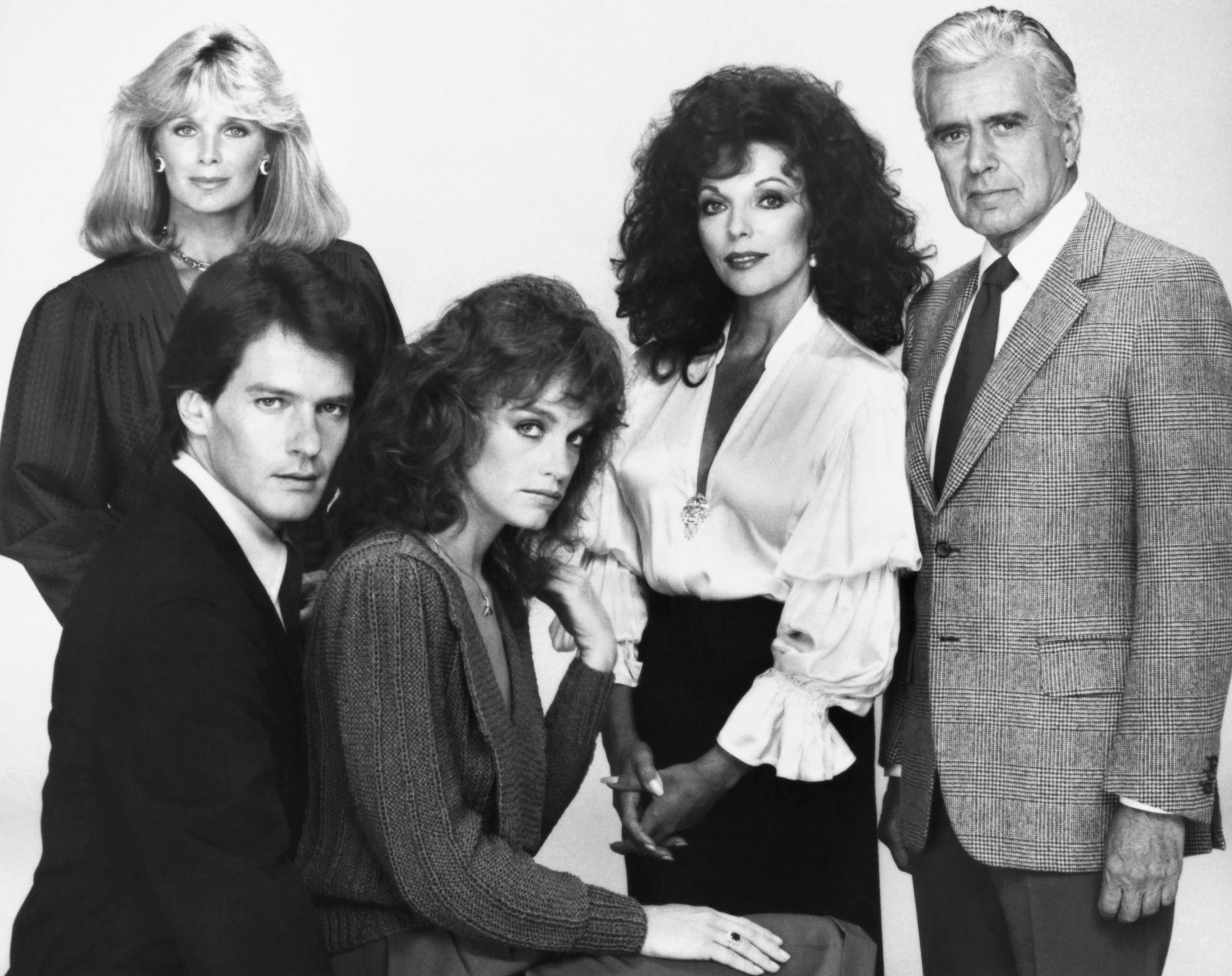 Studio photo of the "Dynasty" cast taken on set in October 1981| Source: Getty Images