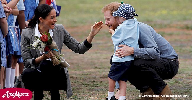 Little boy stole the show by freely tugging at Prince Harry's beard 