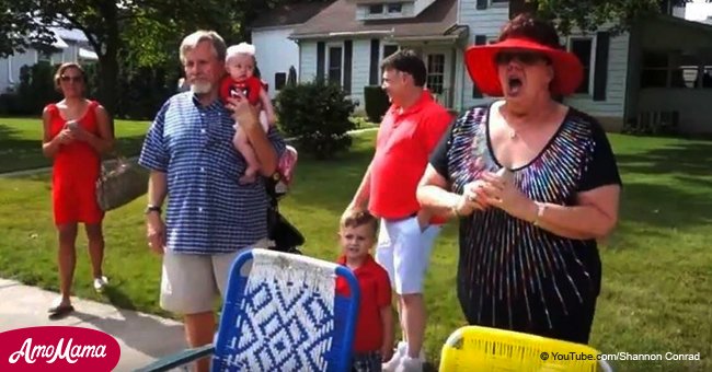 Family is watching the parade when mom suddenly sees her two military sons in the crowd