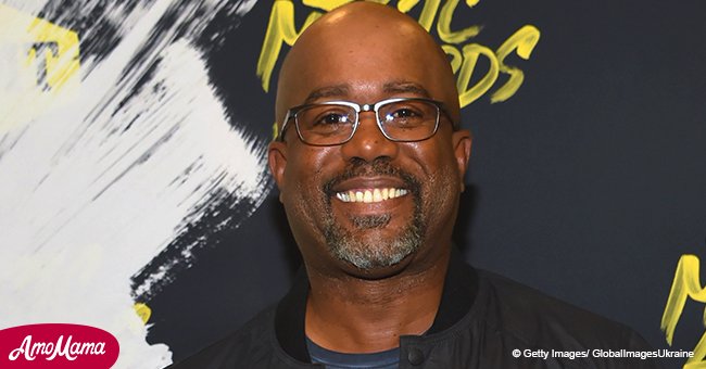 Darius Rucker appears in a copy of Queen Elizabeth's lime green 'Royal wedding' outfit