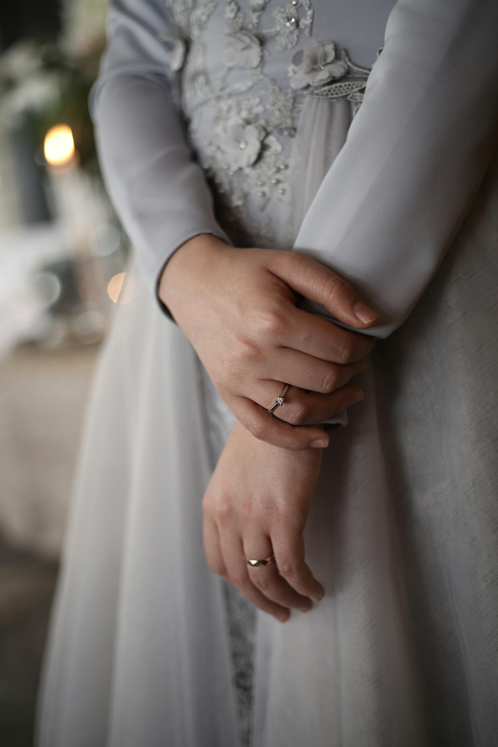 A close-up shot of a woman clasping her wrist | Source: Pexels