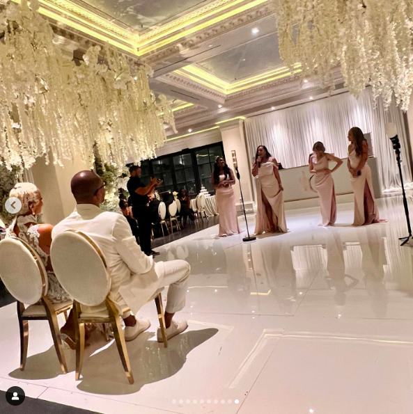 LeToya Luckett and Taleo Coles with the bridal party on their wedding day, posted on August 1, 2024 | Source: Instagram/valeisha