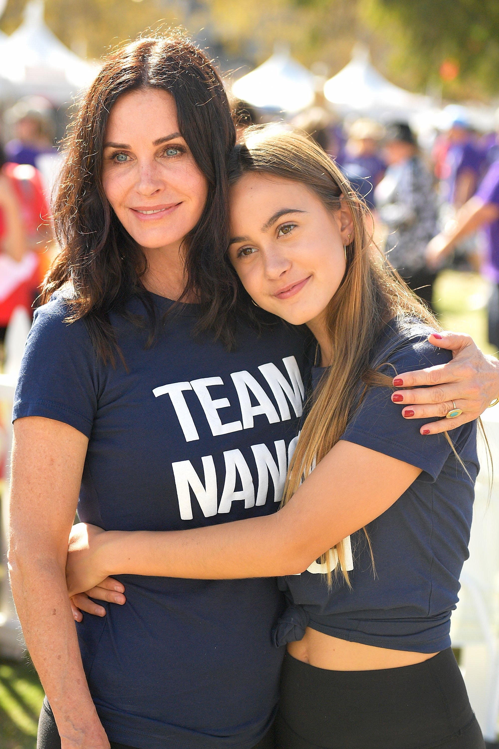 Courteney Cox and Coco Arquette attend the Nanci Ryder's "Team Nanci" participates in the 15th Annual LA County Walk to Defeat ALS at Exposition Park on October 15, 2017, in Los Angeles, California. | Source: Getty Images.