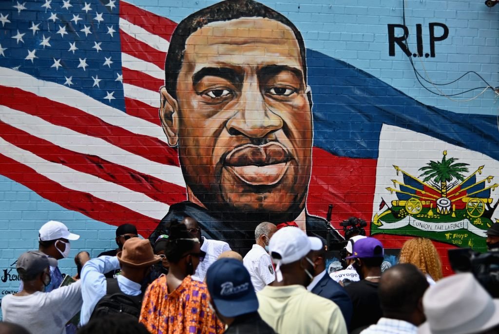 A memorial portrait of George Floyd painted on a storefront sidewall of CTown Supermarket on July 13, 2020 in Brooklyn, New York. | Photo: Getty Images