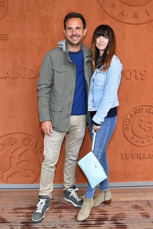 Le chef pâtissier Christophe Michalak et sa femme, l'humoriste Delphine McCarty, assistent à l'édition 2019 des Internationaux de France de tennis à Roland Garros le 05 juin 2019 à Paris, France. | Photo : Getty Images