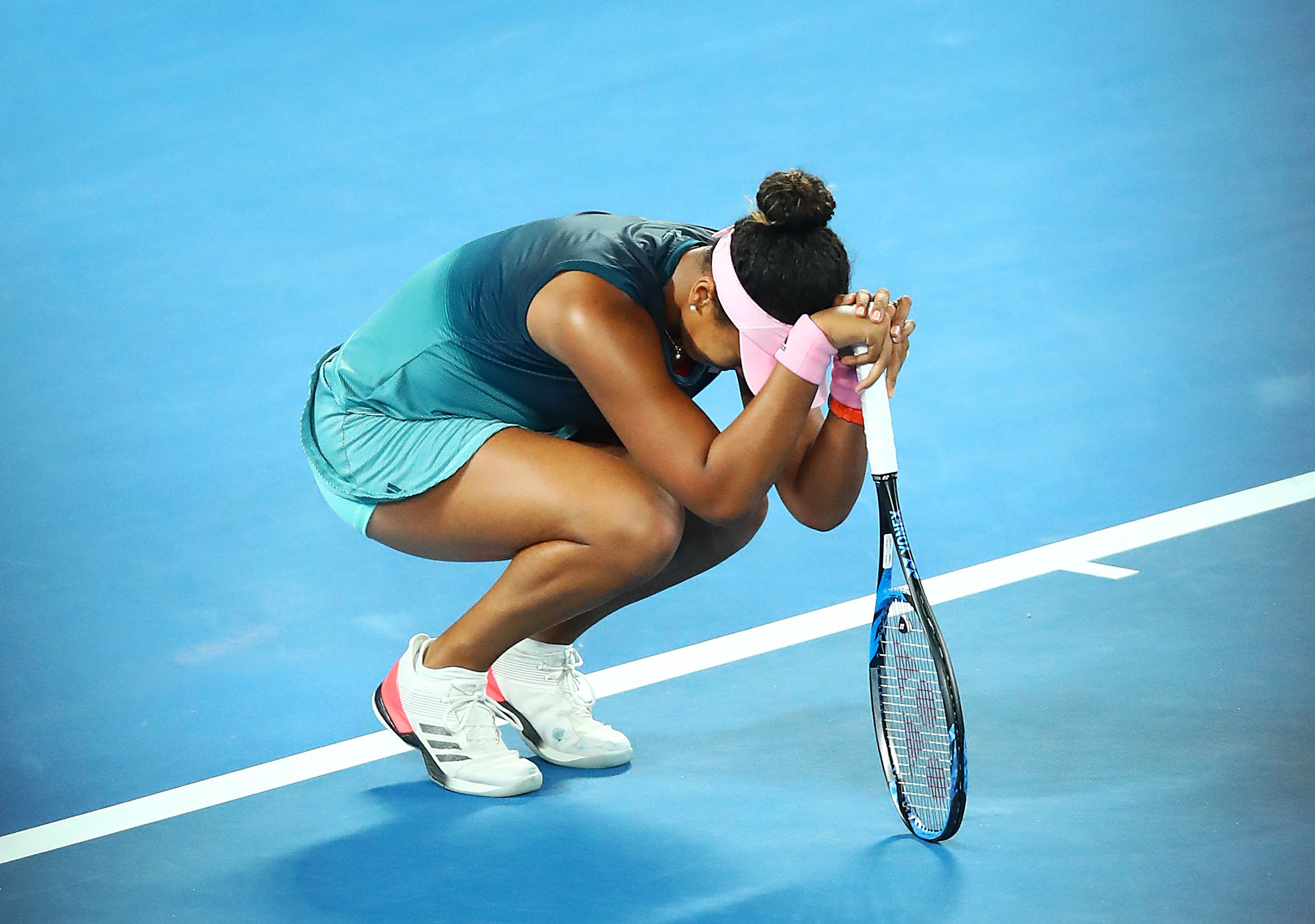 Naomi Osaka of Japan takes part in a lap of honor with Daphne Akhurst at the 2019 Australian Open on January 26, 2019 in Melbourne. | Photo: Getty Images