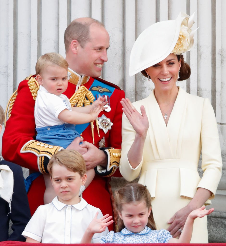 Prince William, Duke of Cambridge, Catherine, Duchess of Cambridge, Prince Louis of Cambridge, Prince George of Cambridge and Princess Charlotte of Cambridge stand on the balcony of Buckingham Palace during Trooping The Colour. | Photo: Getty Images