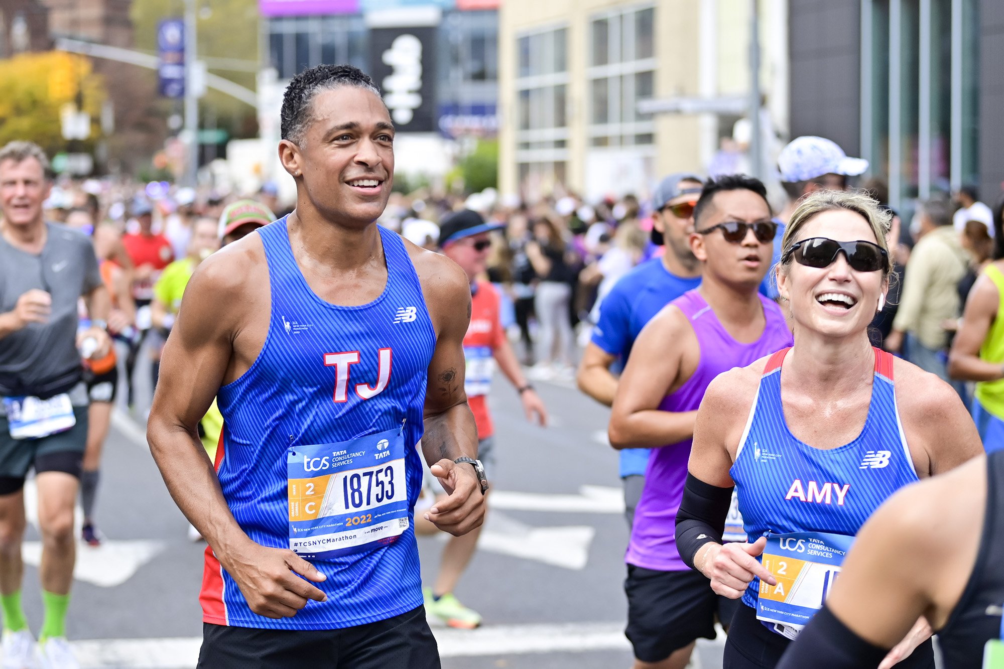 TJ Holmes and Amy Robach run during the 2022 TCS New York Road City Marathon in New York City on November 06, 2022. | Source: Getty Images