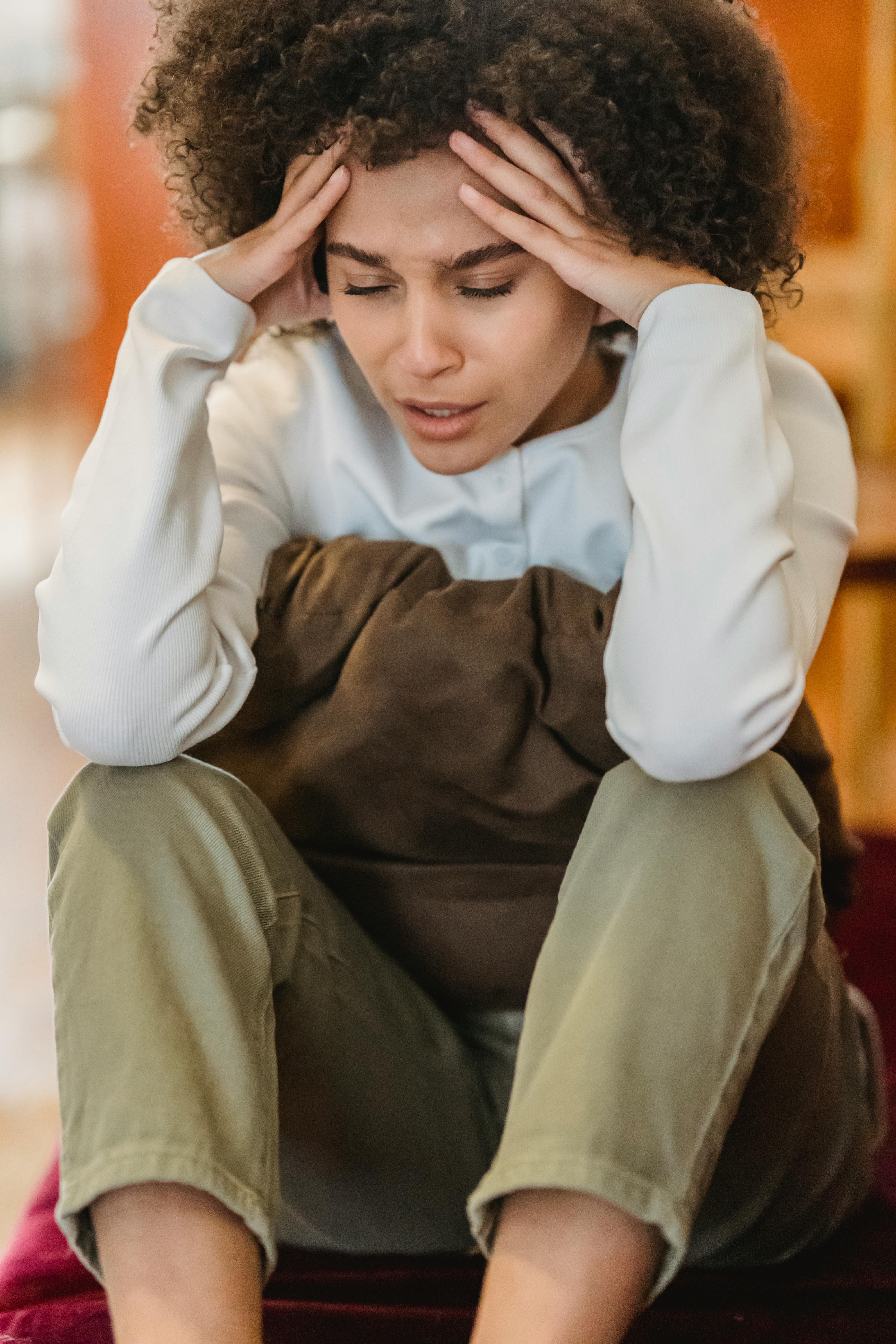 An upset woman reacting to something | Source: Pexels