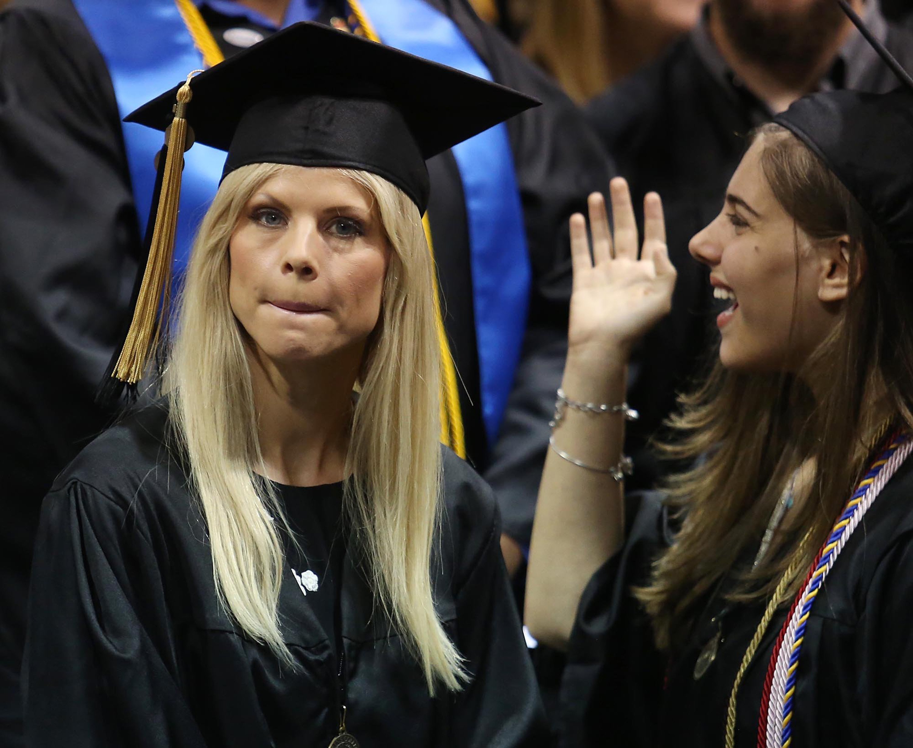 Elin Nordegren watches during commencement ceremonies at Rollins College on May 10, 2014, in Winter Park, Florida | Source: Getty Images