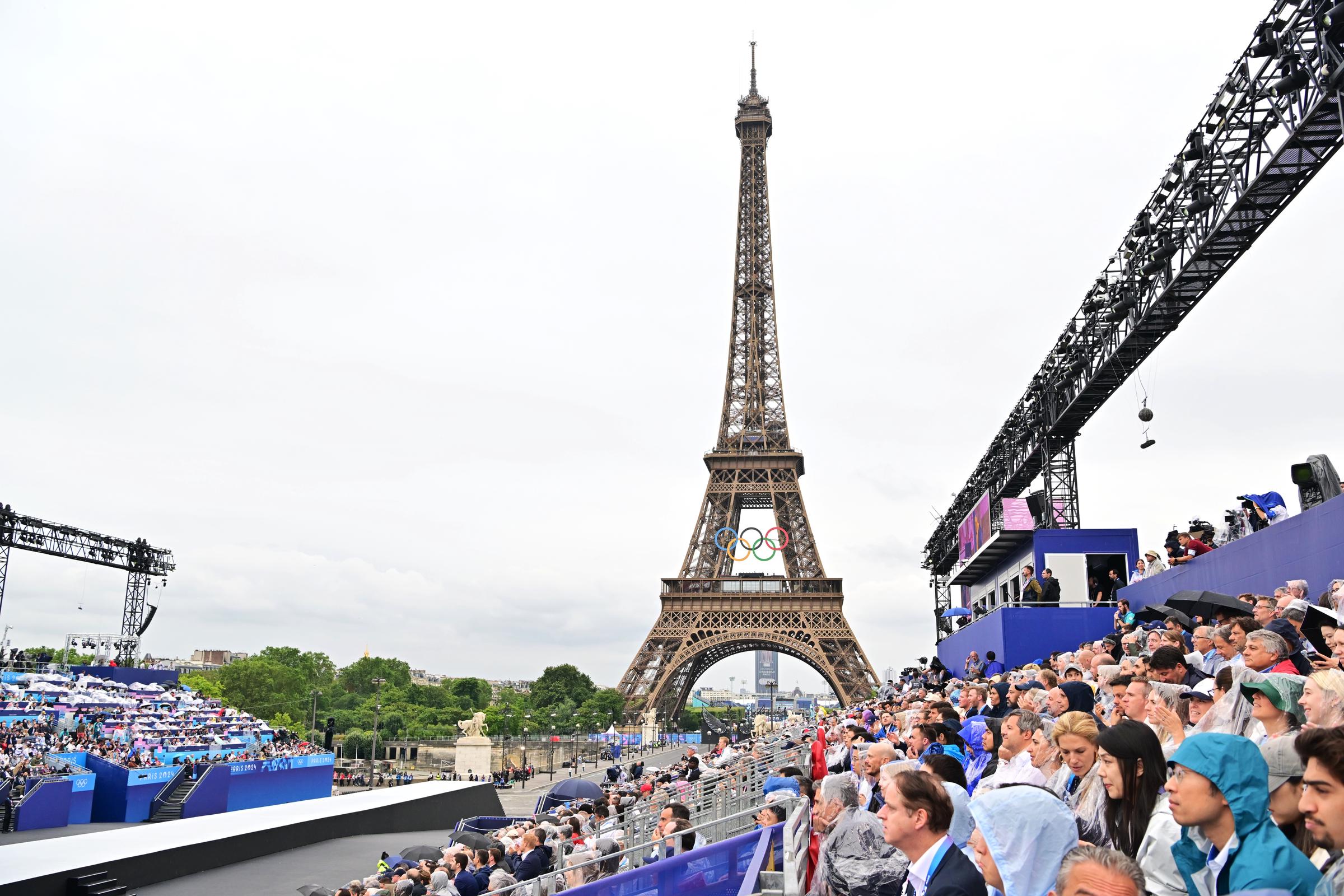 Spectators look on along the River Seine prior to the opening ceremony of the Olympic Games Paris 2024 in Paris, France, on July 26, 2024. | Source: Getty Images