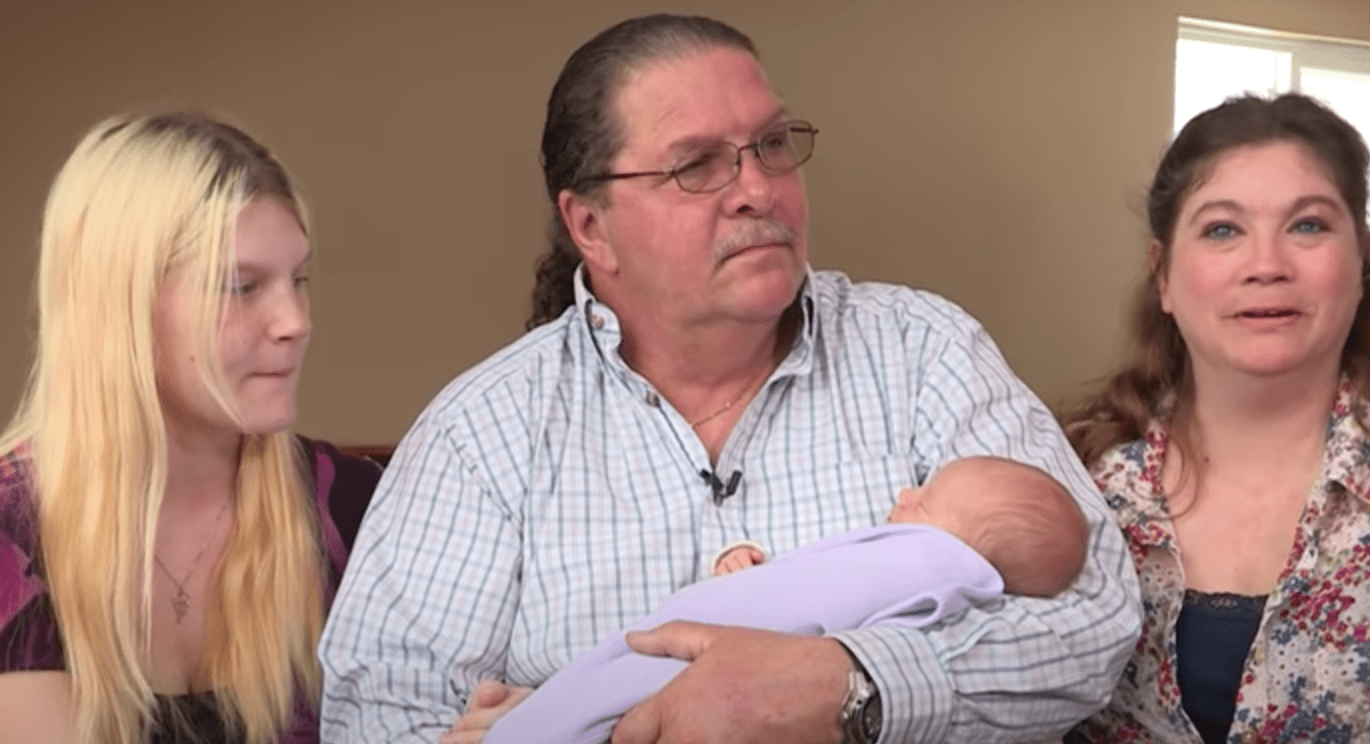 A husband, his wives and the baby they parent together. | Source: youtube.com/truly