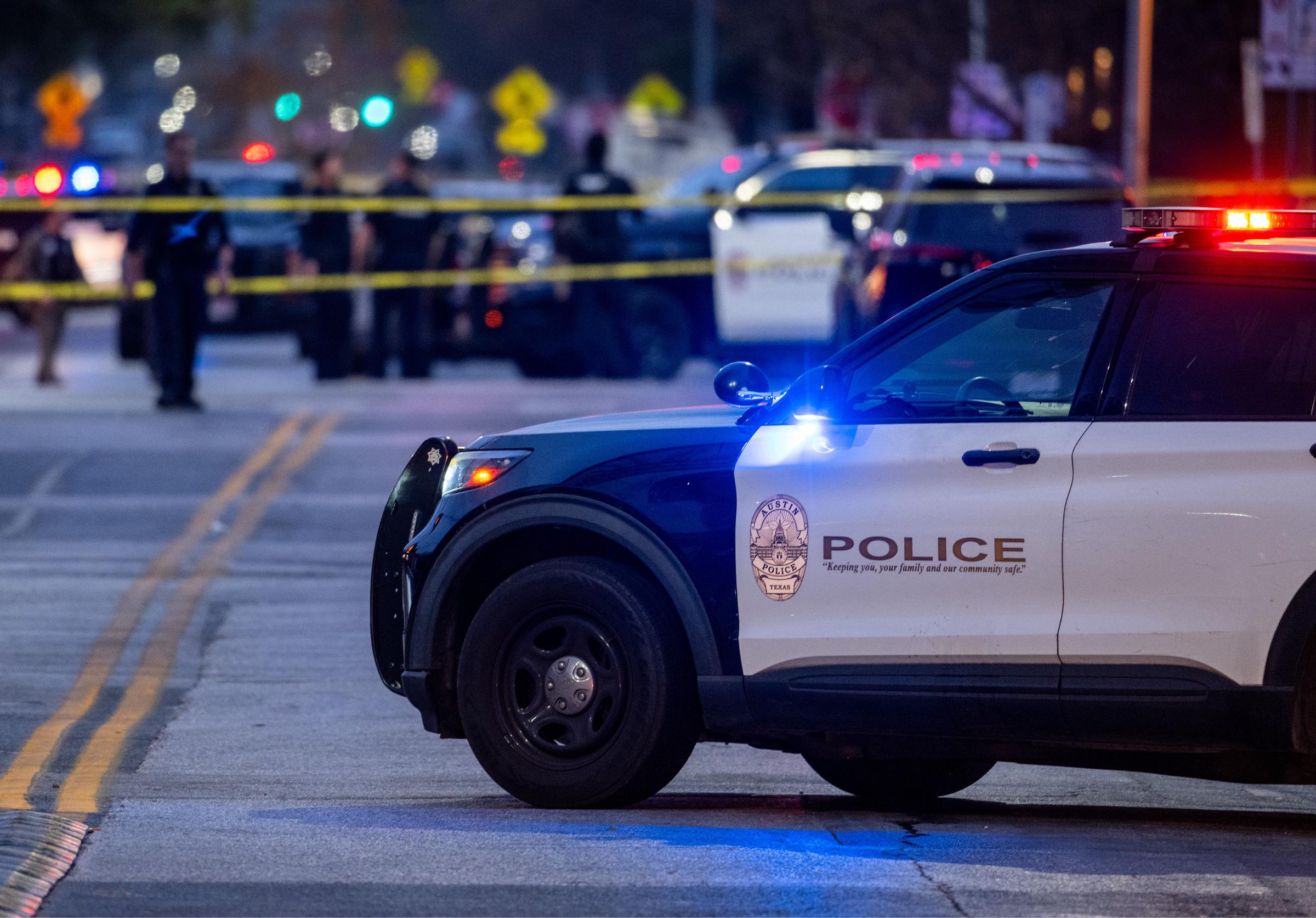 Law enforcement patrol an intersection near Buford's bar in downtown on March 01, 2026 in Austin, Texas | Source: Getty Images