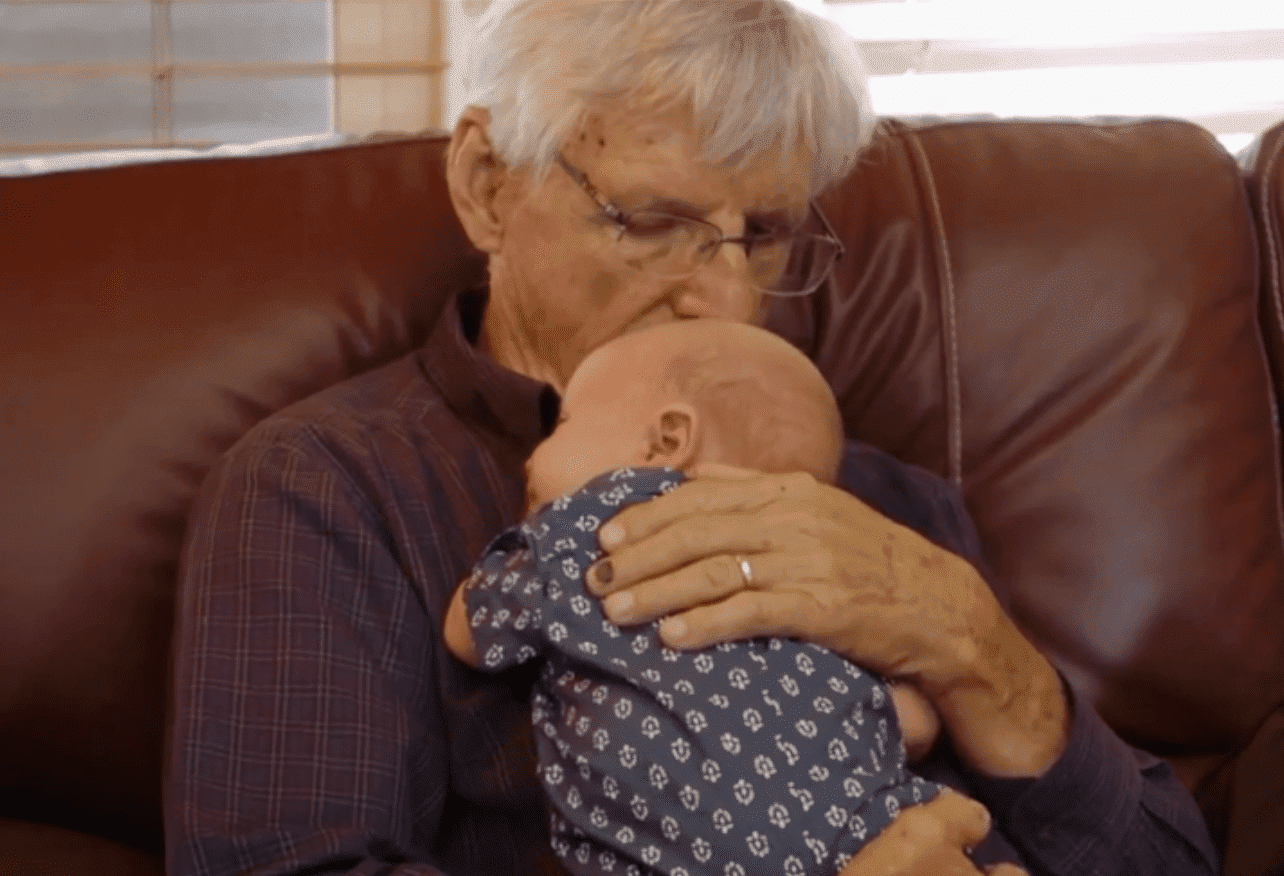 During "Little People, Big World's" episode titled, "Four Generations of Roloffs," Ron Rollof cuddles with his great grandson, Jackson Roloff | Source: goodhousekeeping.com