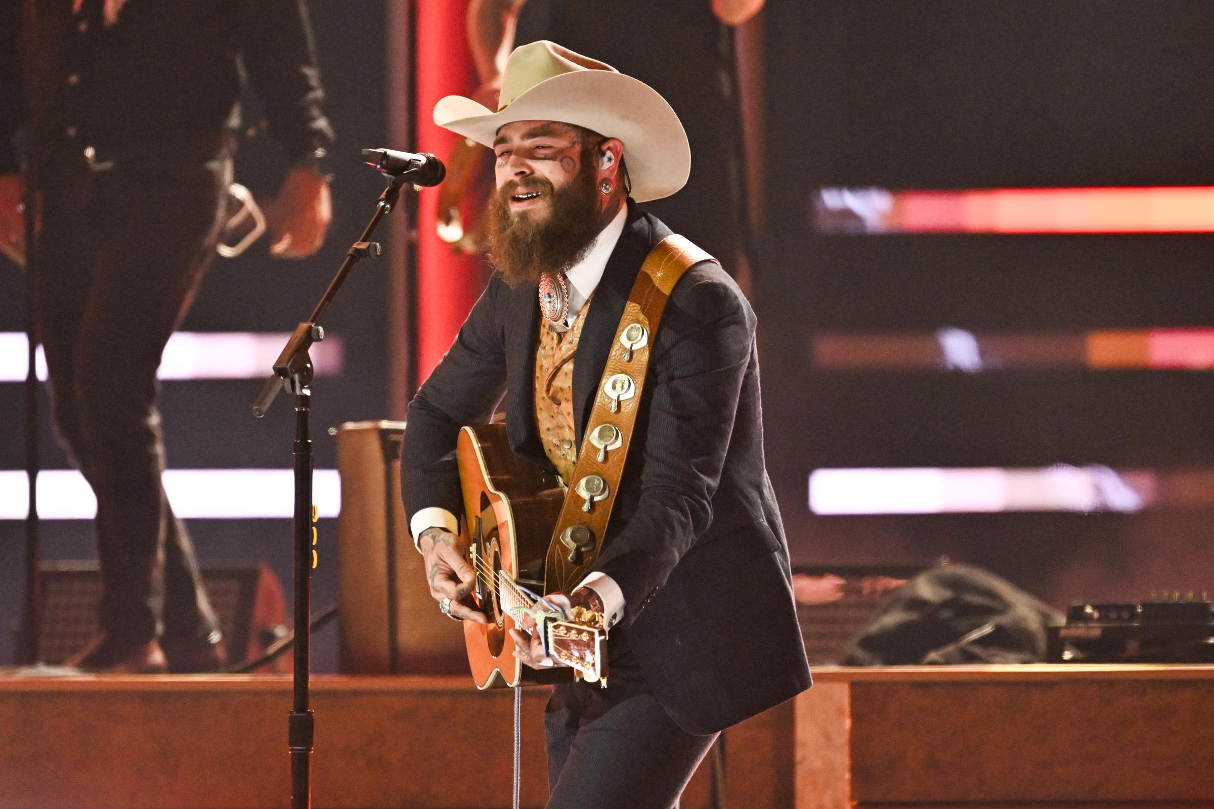 Post Malone performs onstage during The 58th Annual CMA Awards at Bridgestone Arena on November 20, 2024, in Nashville, Tennessee | Source: Getty Images