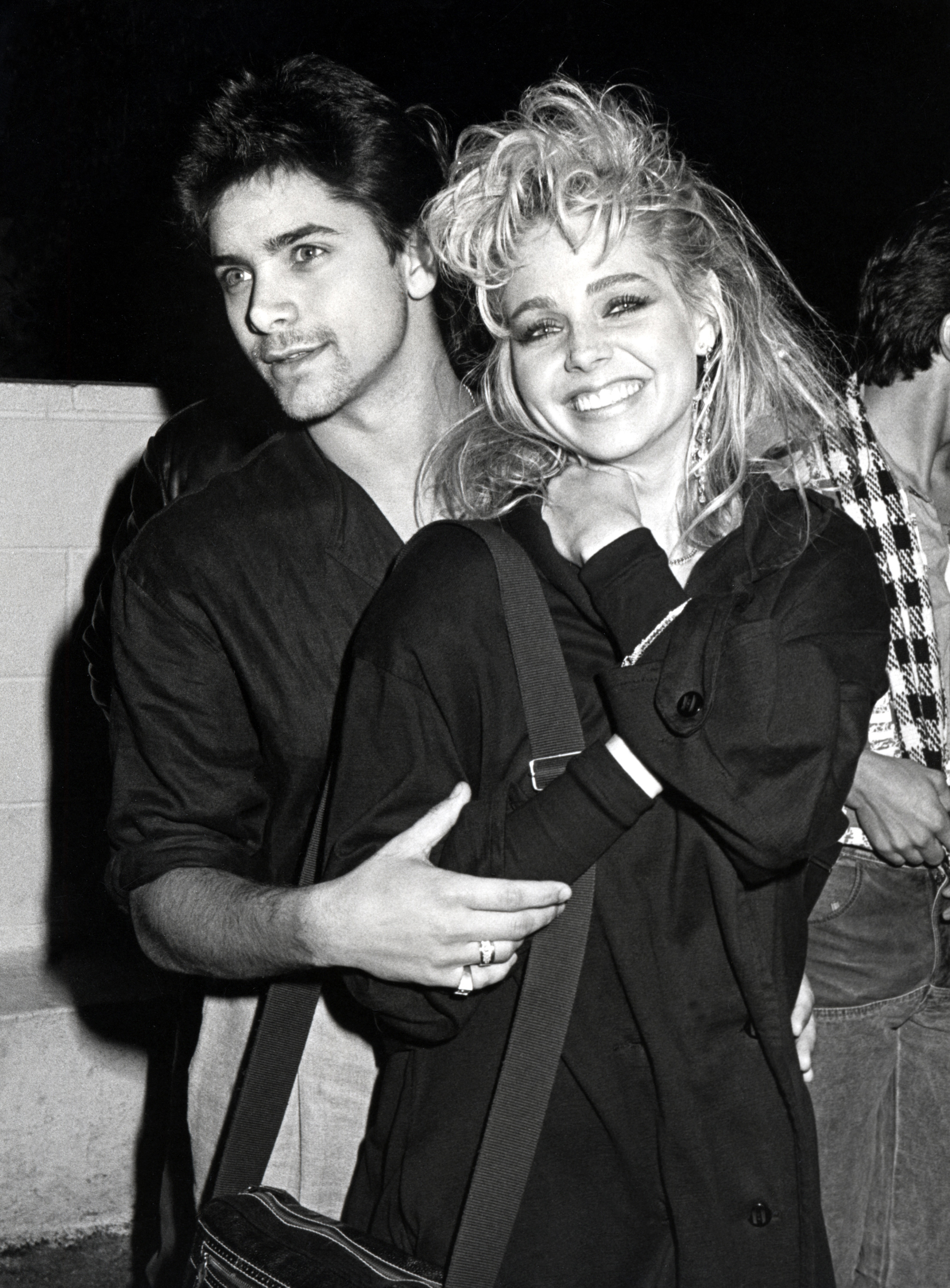 John Stamos and Teri Copley during Party For Hall & Oates at Spago's Restaurant on December 17, 1984 in Hollywood, California | Source: Getty Images