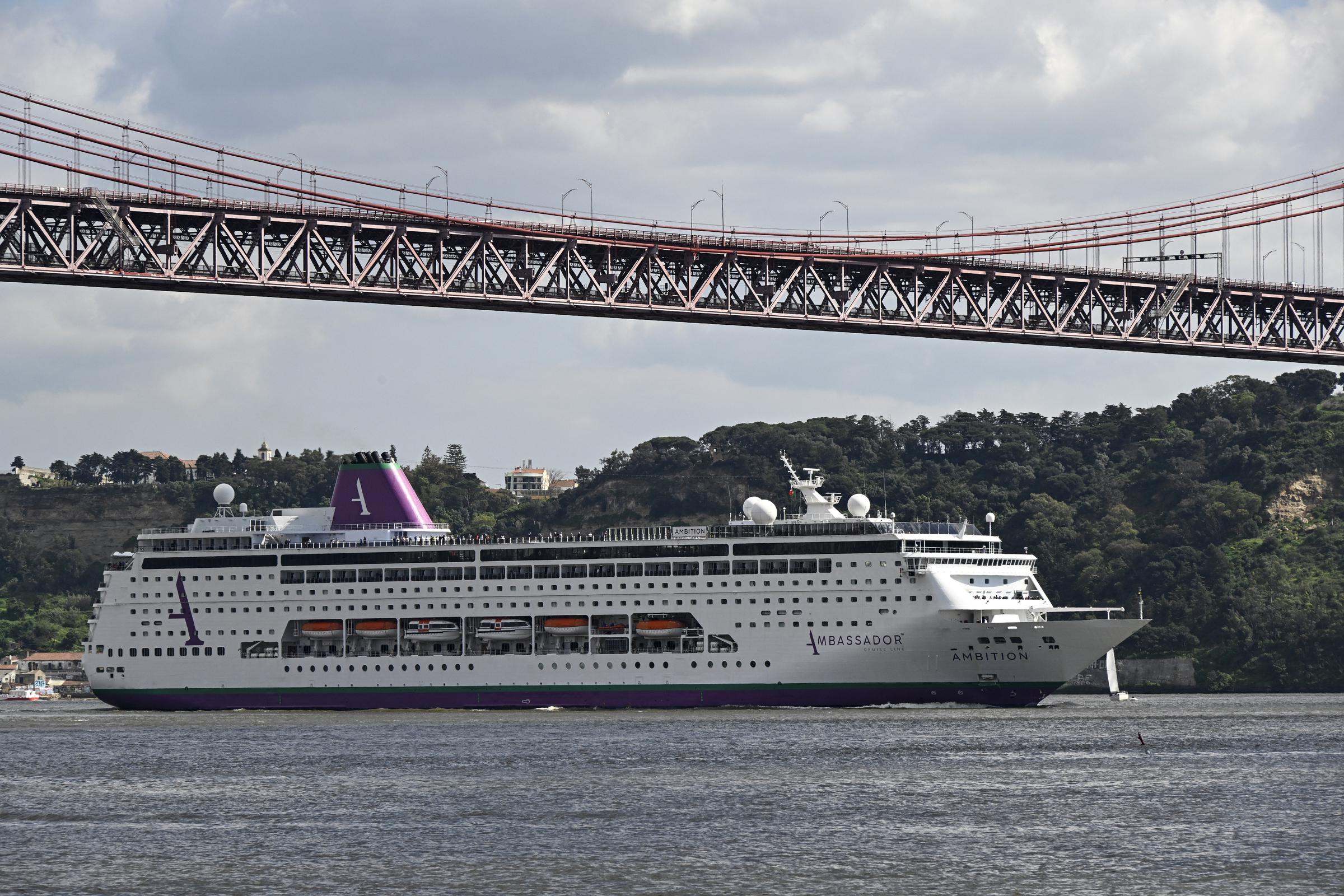 MS Ambition, a 48,200 GT cruise ship operated by Ambassador Cruise Line, sails the Tagus River after leaving the Cruise Terminal on March 26, 2025 in Lisbon, Portugal. | Source: Getty Images