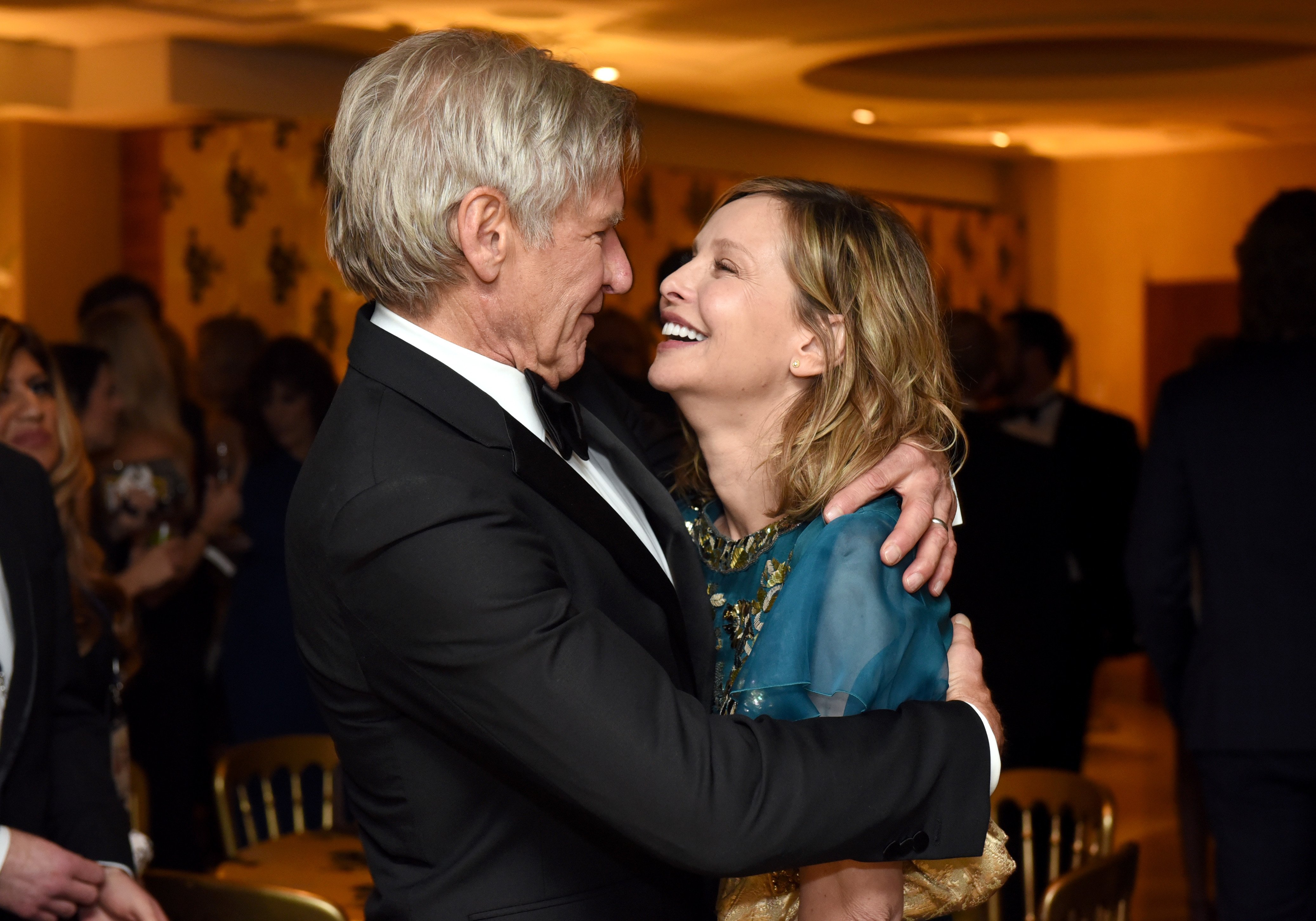 Actors Harrison Ford (L) and Calista Flockhart attend HBO's Official Golden Globe Awards After Party at The Beverly Hilton Hotel on January 10, 2016 in Beverly Hills, California.| Source: Getty Images