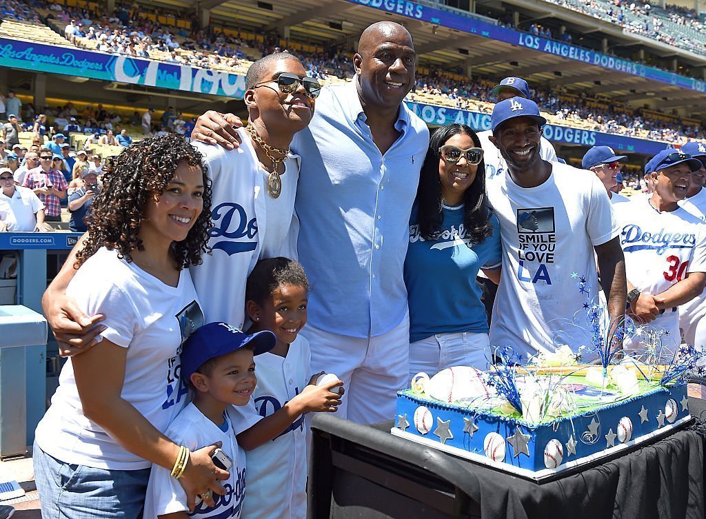 Former NBA great Magic Johnson celebrates his birthday with his family before the game between the Los Angeles Dodgers  | Getty Images