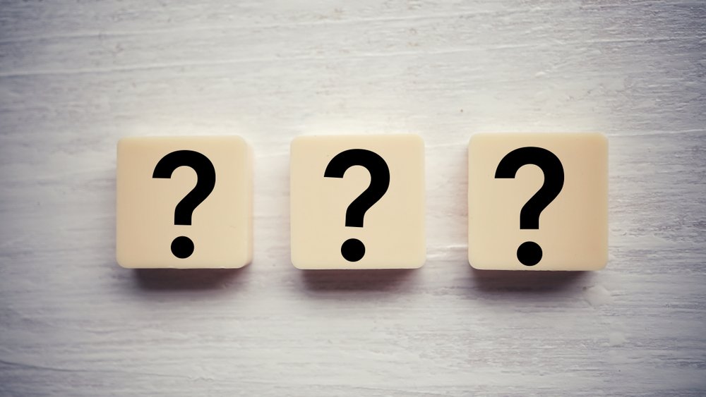 A photo that shows three question mark symbols | Photo: Shutterstock