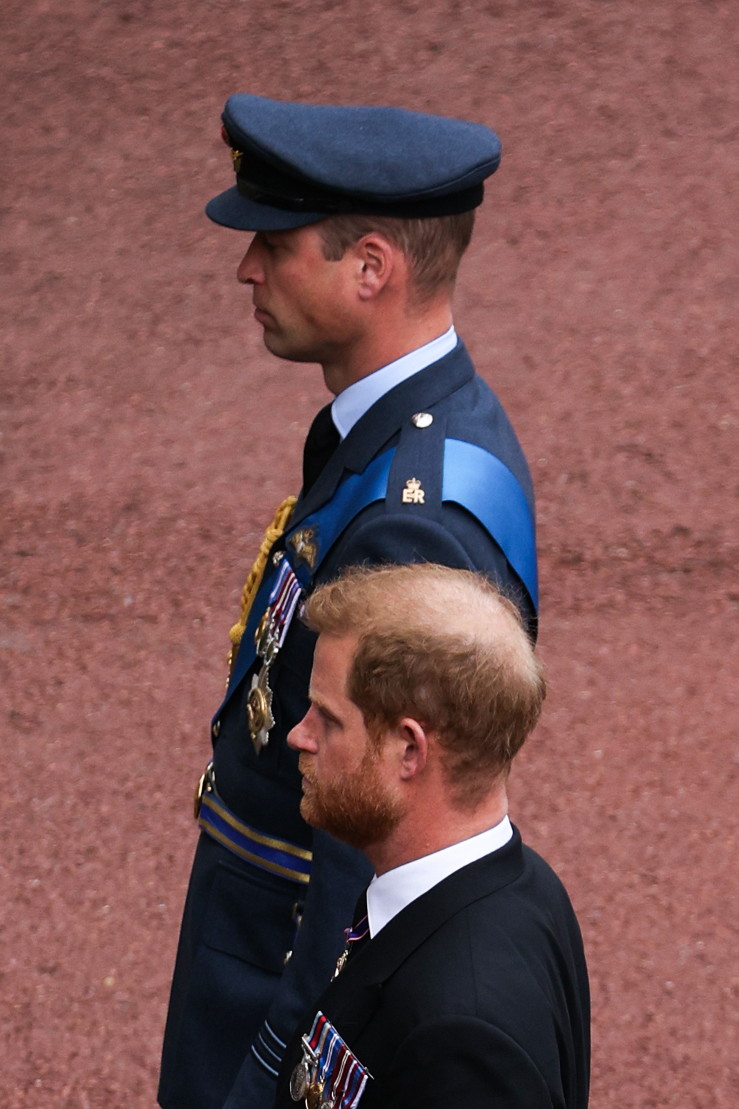 Prince William and Prince Harry during the Procession of the coffin of Queen Elizabeth II in London, England on September 19, 2022 in Windsor, England | Source: Getty Images