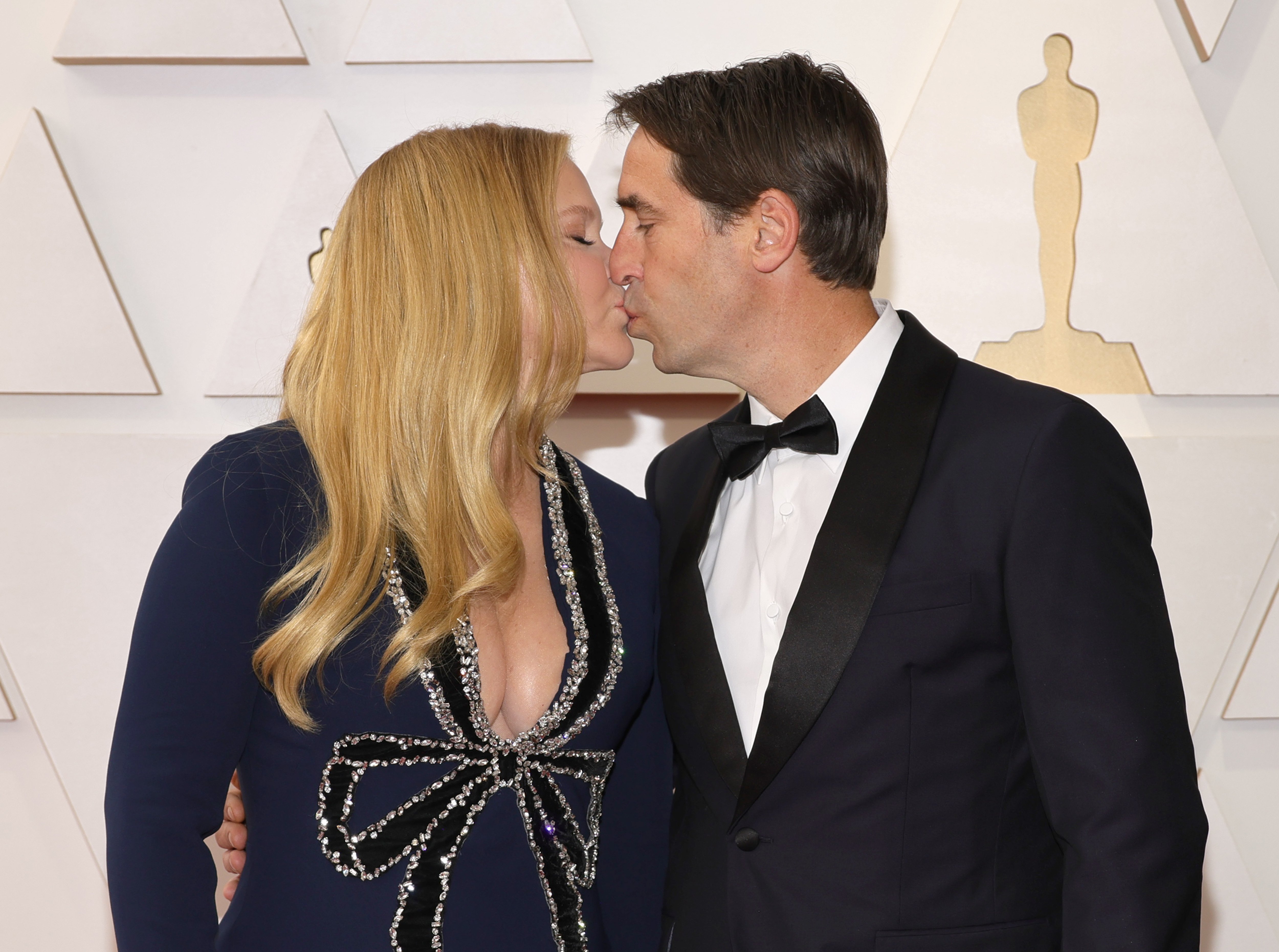 Amy Schumer and Chris Fischer attend the 94th Annual Academy Awards at Hollywood and Highland on March 27, 2022 in Hollywood, California | Source: Getty Images 