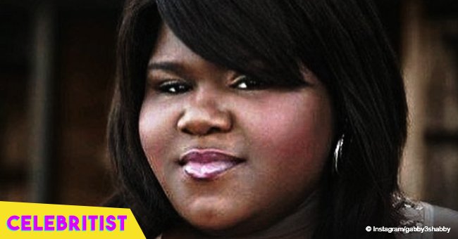 Gabby Sidibe puts slimmer curves on display in off-shoulder top & black skirt in pic with friend	