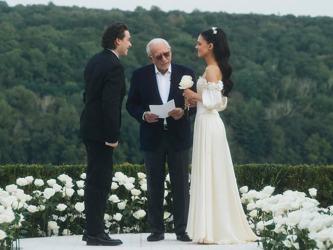 Brooklyn Beckham and Nicola Peltz are pictured at the altar on the day of their vow renewel in images published 11 August 2025. | Source: Instagram/brookylnpeltzbeckham