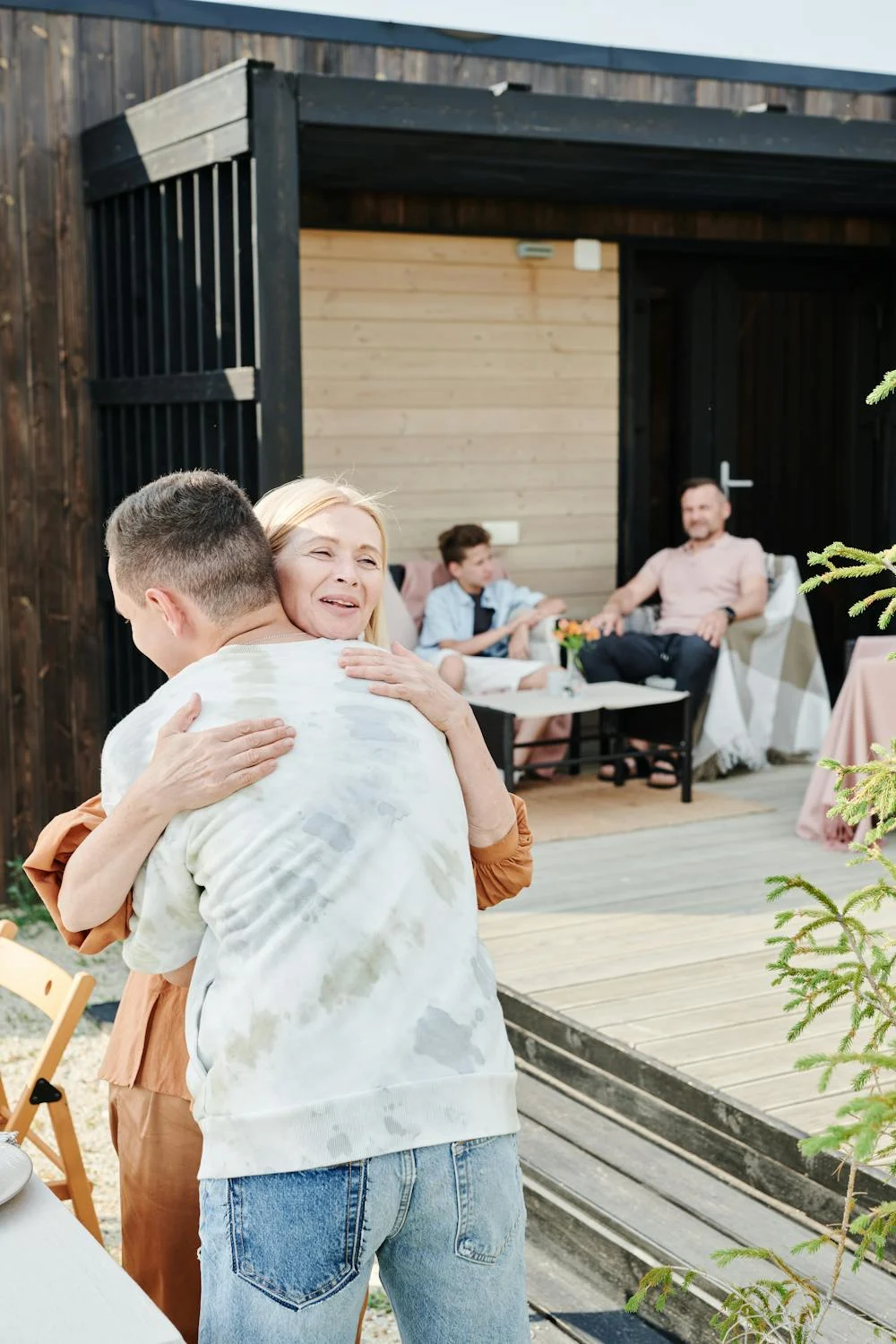 A woman welcoming her son | Source: Pexels