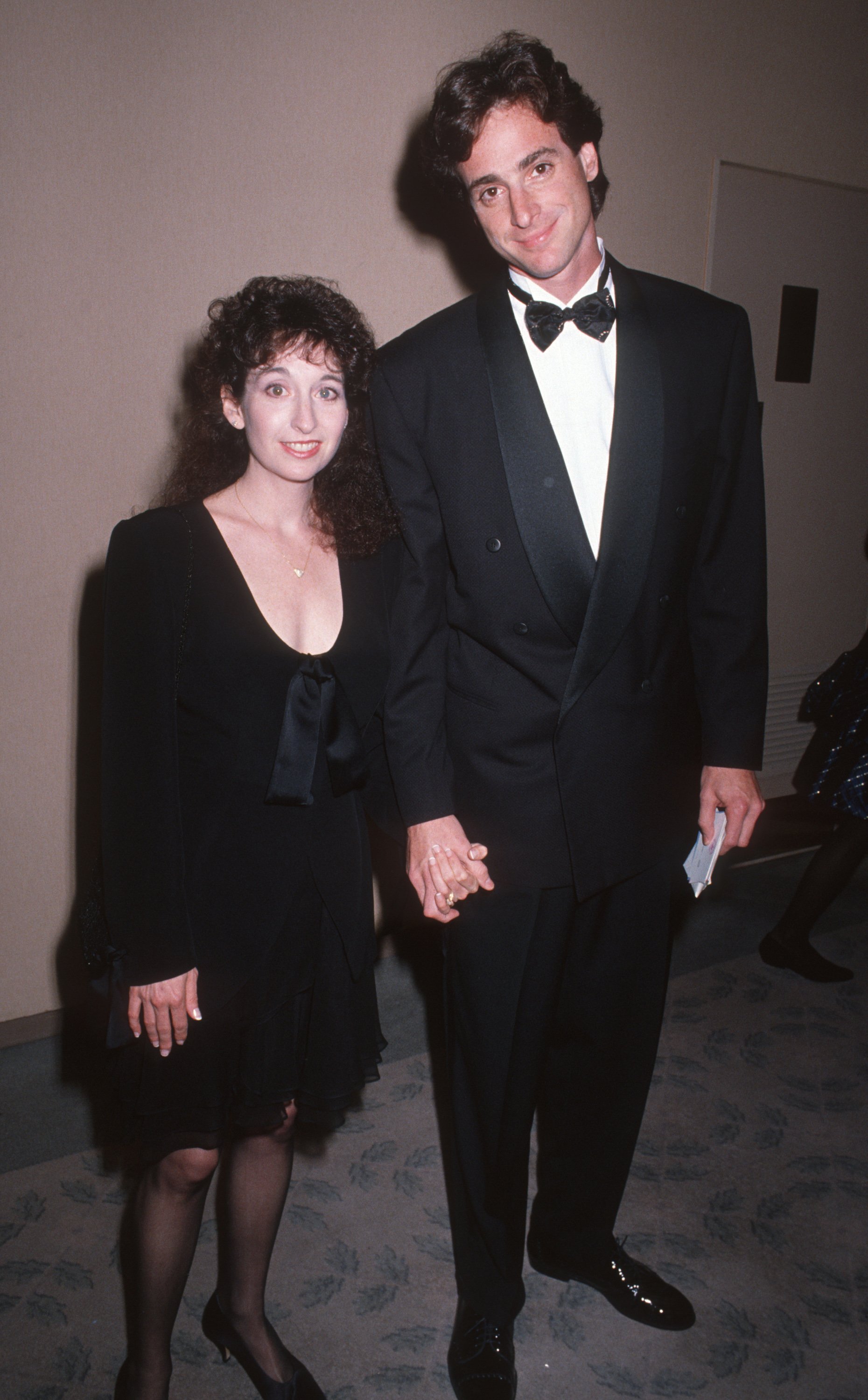 Actress Bob Saget and wife Sherri Kramer attending 'Carousel of Hope Ball Benefit' on October 26, 1990 at the Beverly Hilton Hotel in Beverly Hills, California. | Source: Getty Images