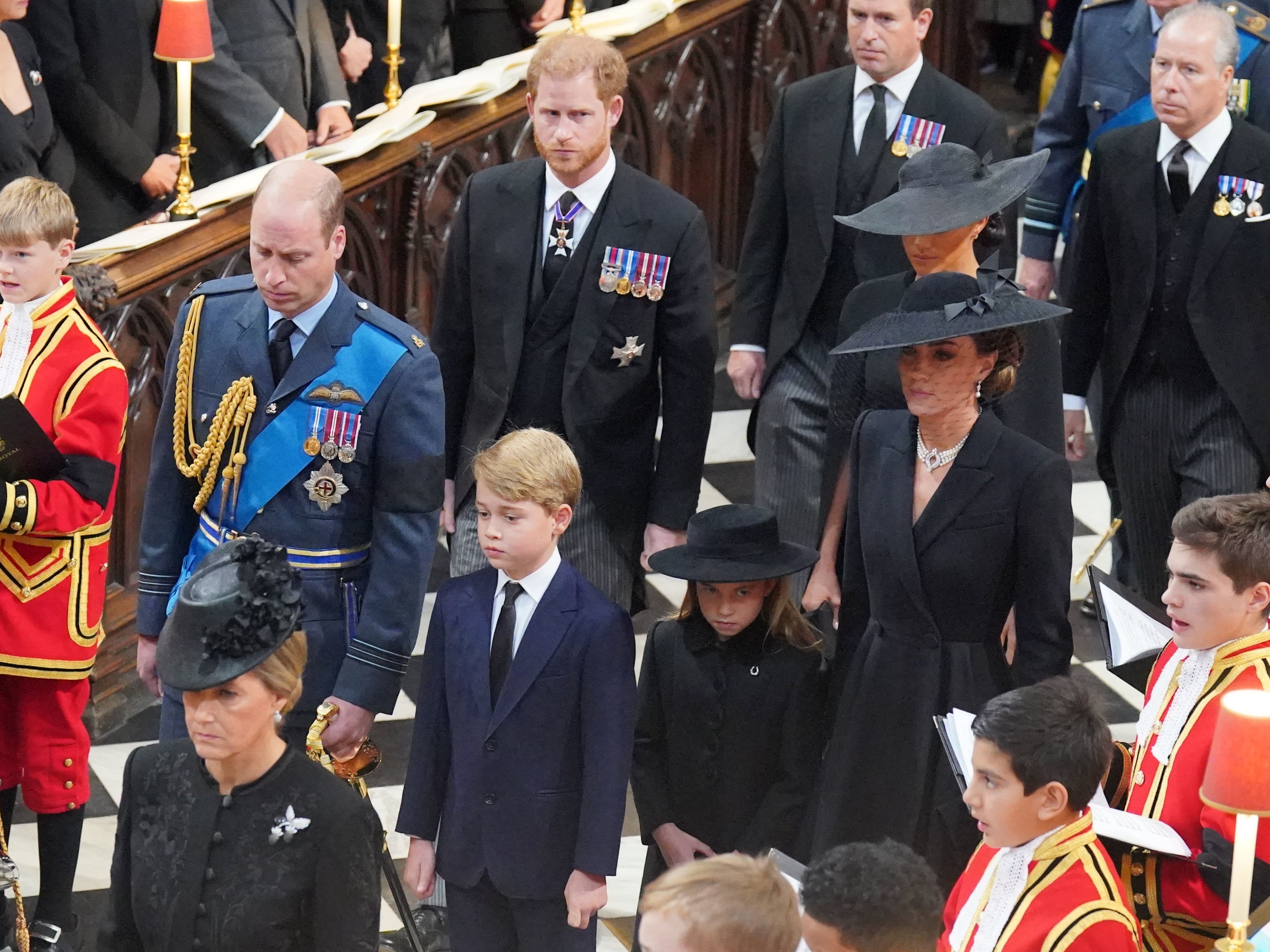 Prince William, Prince George, Prince Harry, Meghan Markle and Kate Middleton, during the state funeral of Queen Elizabeth II at Westminster Abbey on September 19, 2022 in London, England | Source: Getty Images