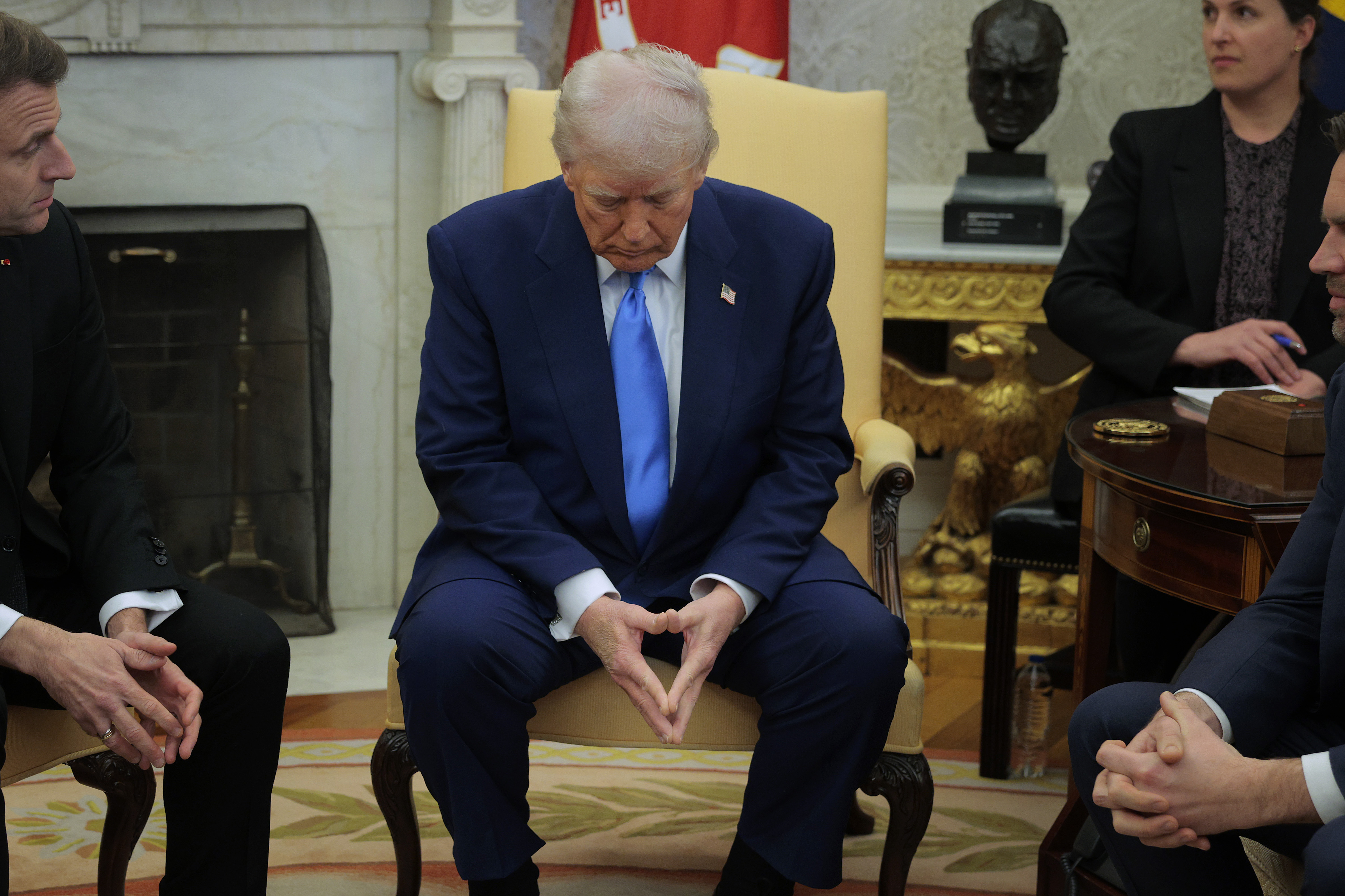 Donald Trump hosts French President Emmanuel Macron for meetings in the Oval Office at the White House in Washington, DC, on February 24, 2025 | Source: Getty Images