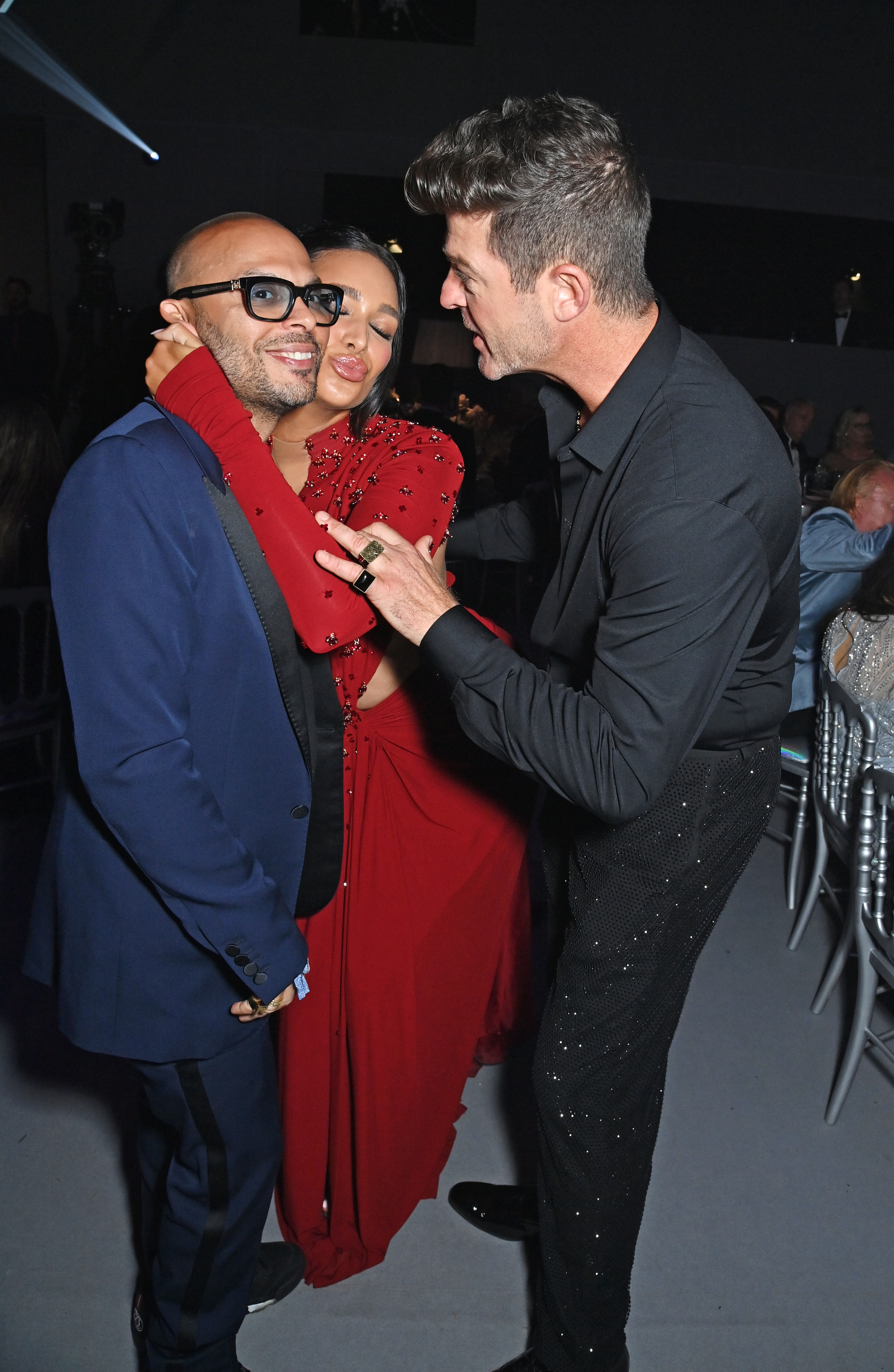 Richie Akiva, April Love Geary, and Robin Thicke attend the amfAR Cannes Gala 2023 at Hotel du Cap-Eden-Roc on May 25, 2023, in Cap d'Antibes, France. | Source: Getty Images