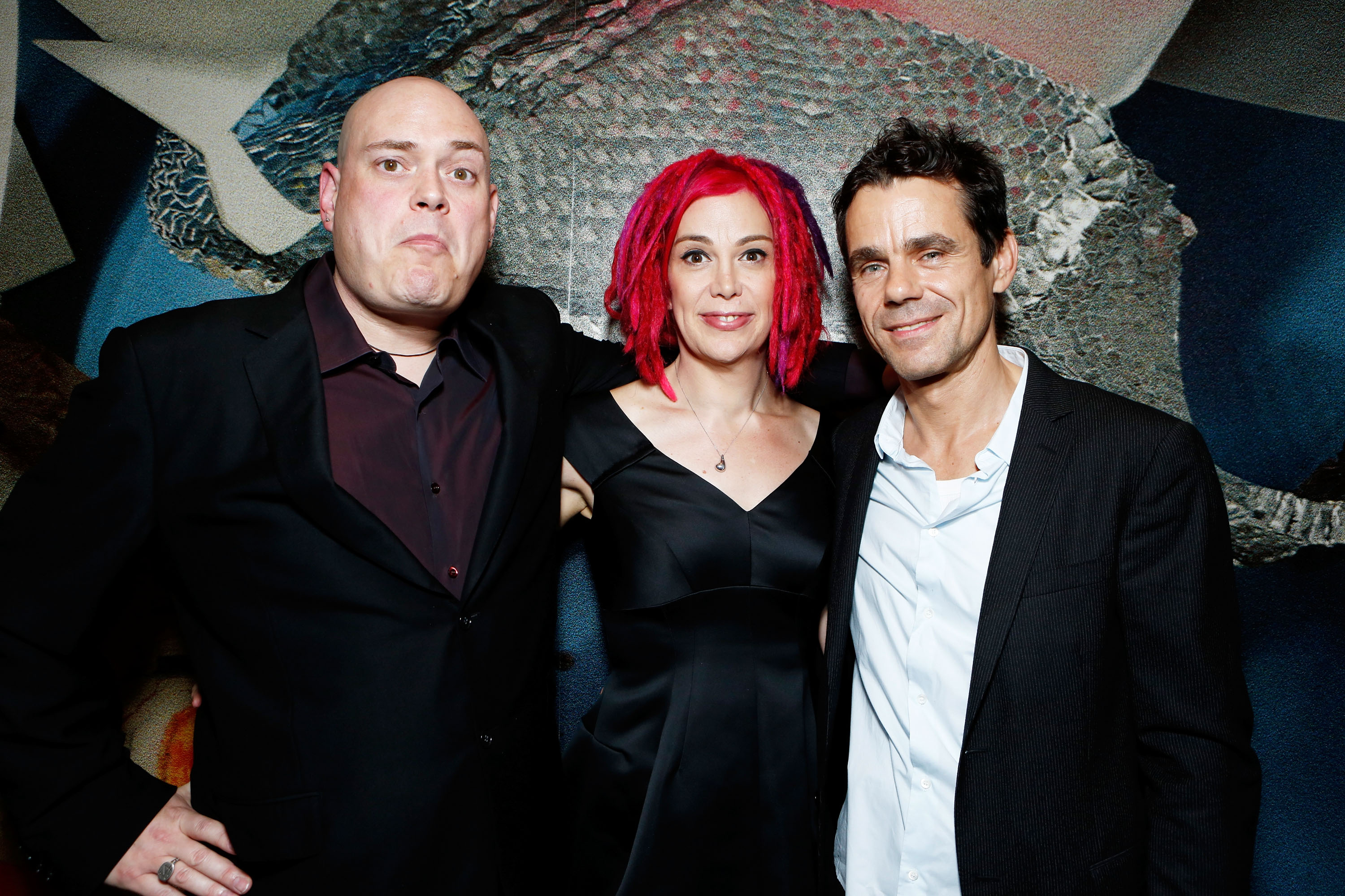 Andy Wachowski, Lana Wachowski, and Tom Tykwer at the premiere of "Cloud Atlas," 2012 | Source: Getty Images