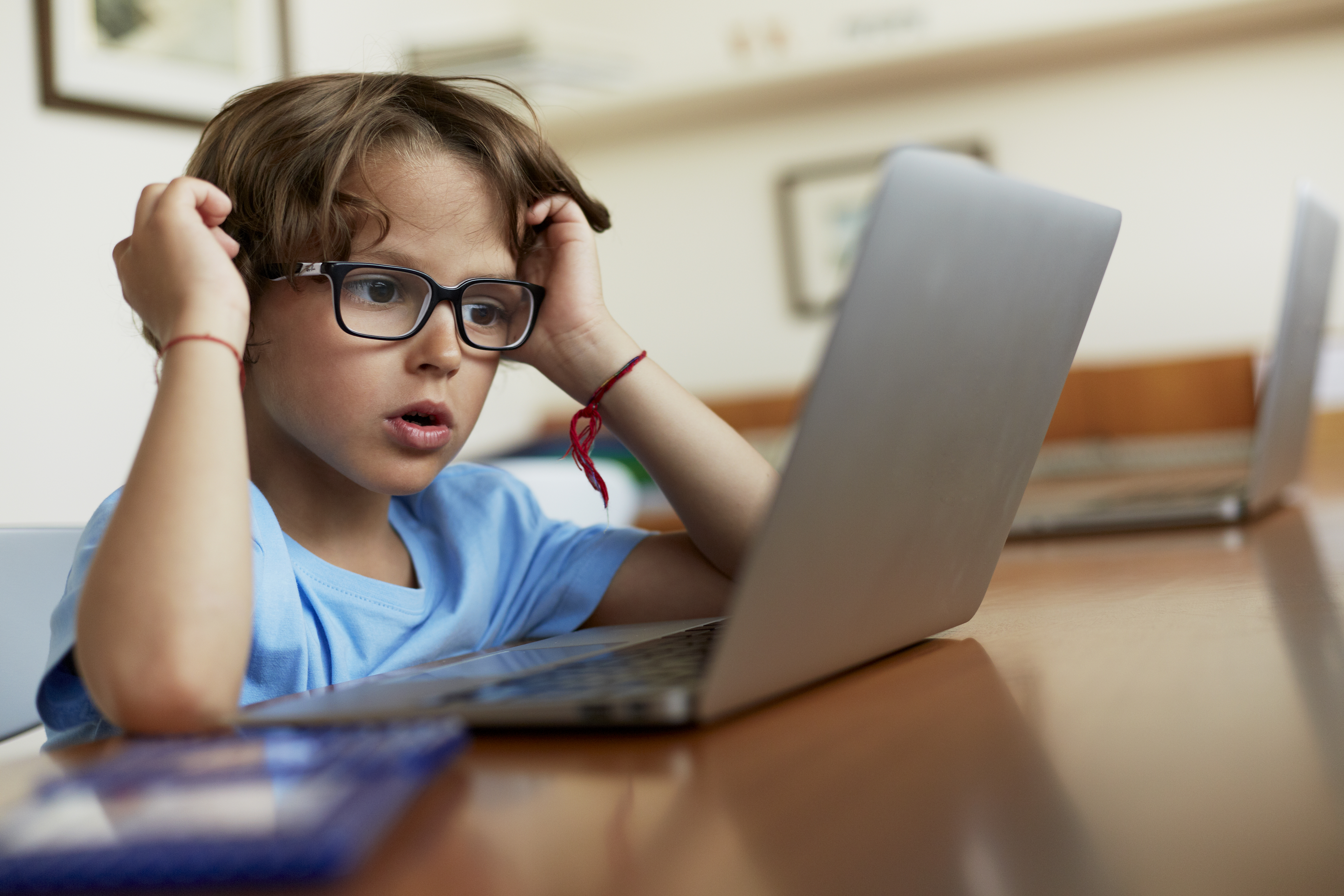 Little boy on a laptop | Source: Getty Images