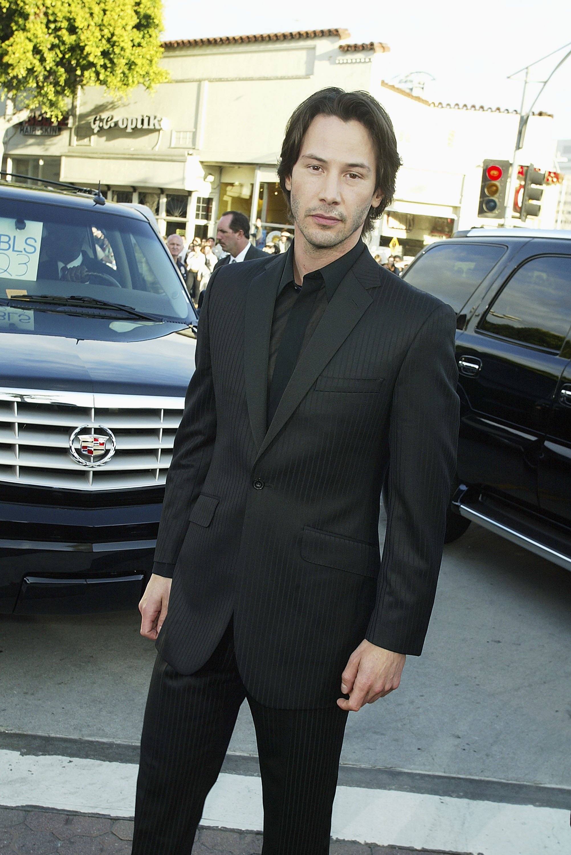 Actor Keanu Reeves arrives at "The Matrix Reloaded" premiere at the Village Theater on May 7, 2003 in Los Angeles, California| Source: Getty Images