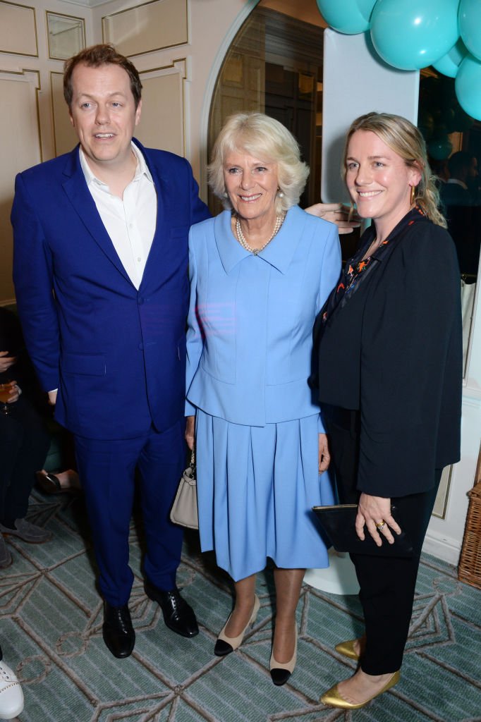 Tom Parker Bowles, Camilla, and Laura Lopes at the launch of the "Fortnum & Mason Christmas & Other Winter Feasts" cookbook by Tom Parker Bowles on October 17, 2018, in London | Photo: Getty Images