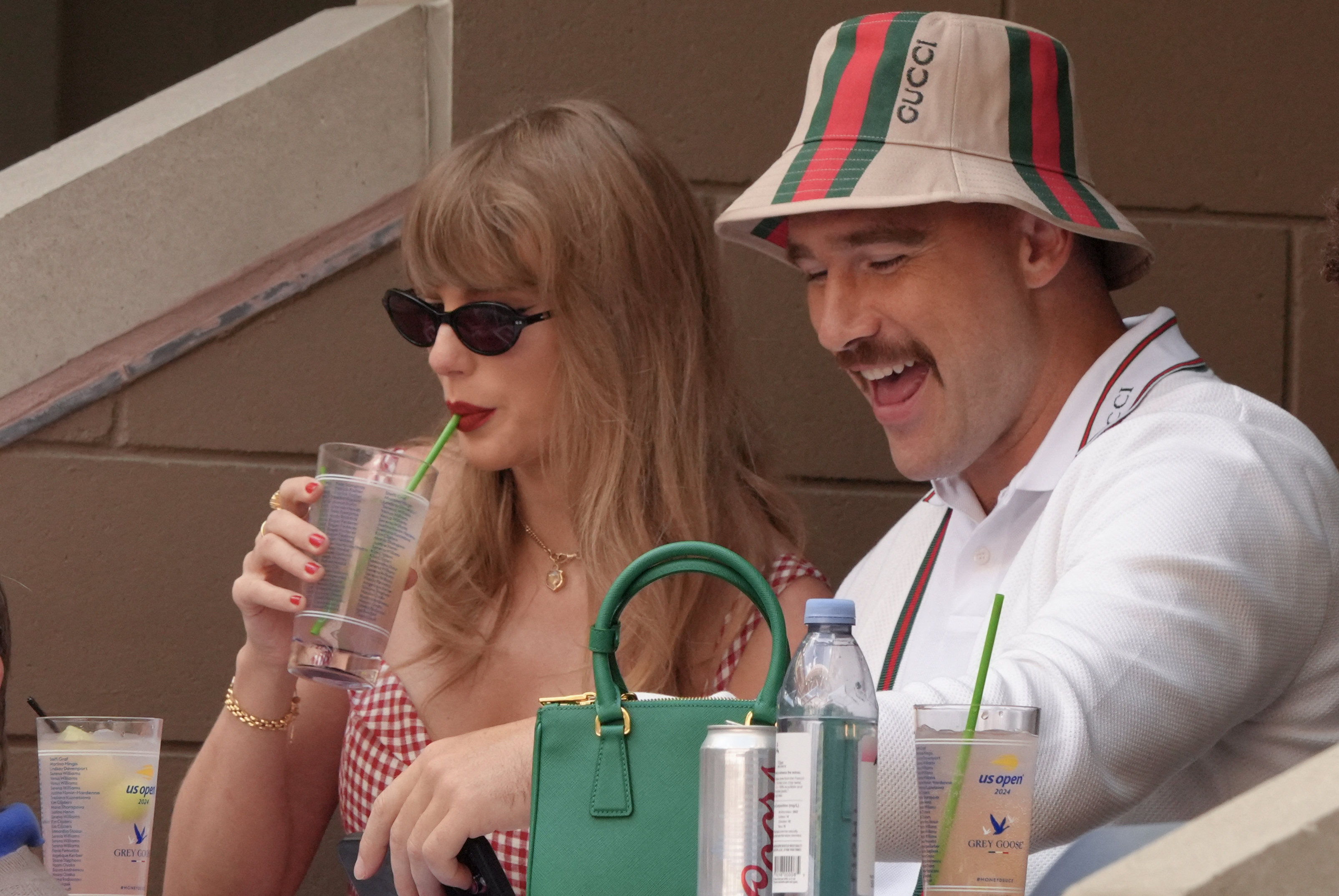 Travis Kelce appearing to be watching something on his phone while at day 14 of the US Open tennis tournament in New York with girlfriend Taylor Swift on September 8, 2024. | Source: Getty Images